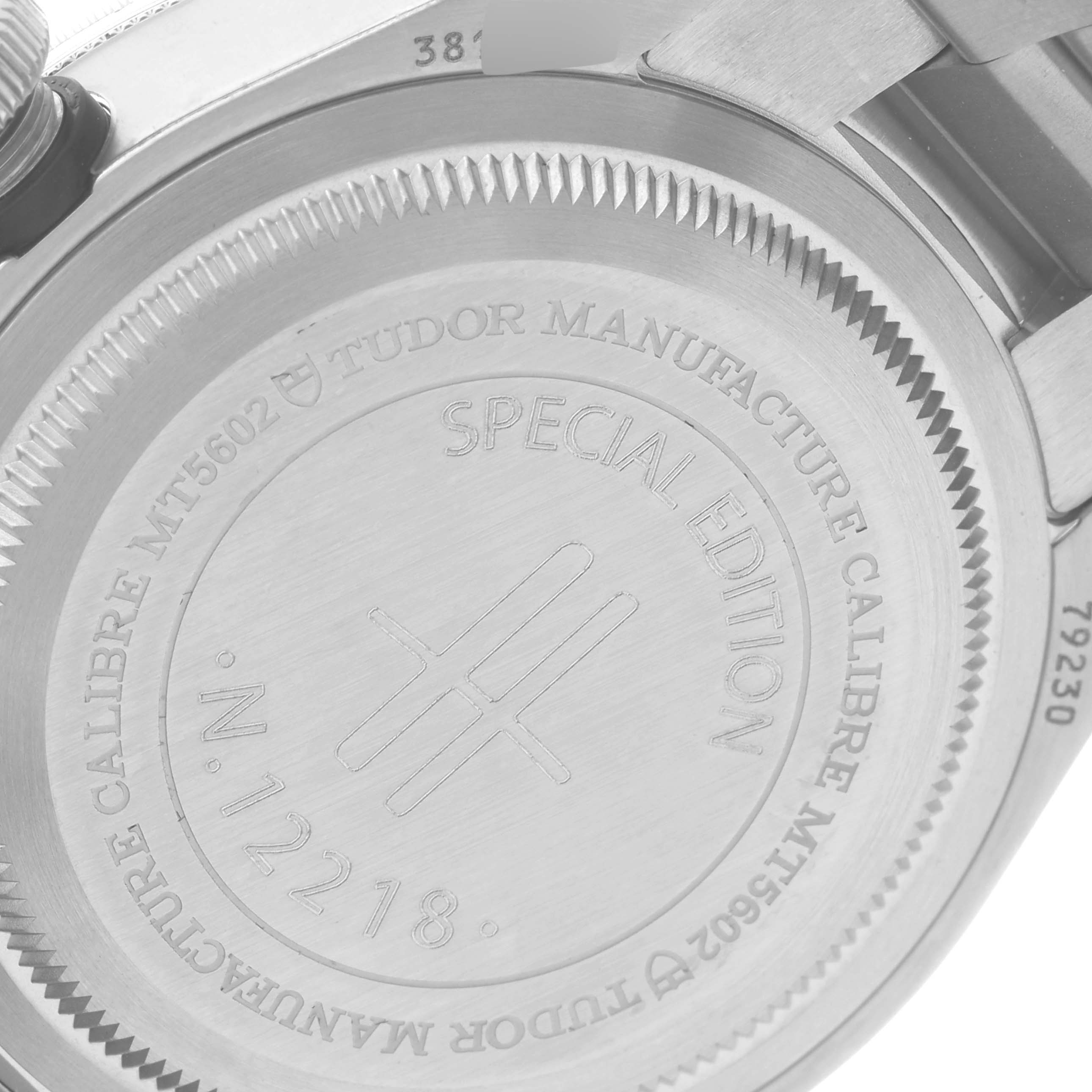 The image shows the back case of the Tudor Heritage Black Bay 79230G Men's Stainless Steel Black Dial 79230G Men's Stainless Steel Black Dial watch, highlighting details about its special edition and movement caliber.