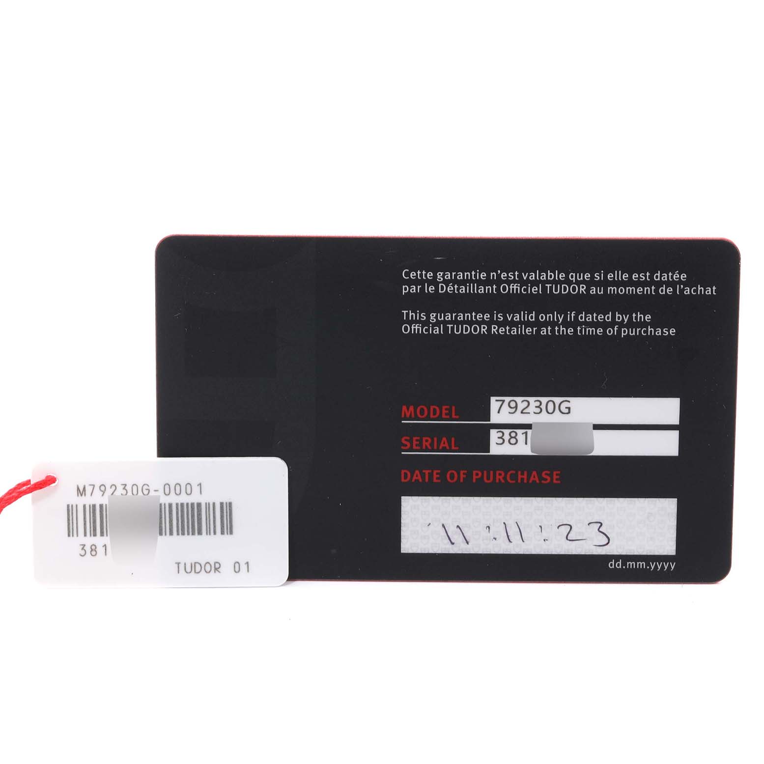 The image shows the warranty card for the Tudor Heritage Black Bay 79230G Men's Stainless Steel Black Dial 79230G Men's Stainless Steel Black Dial watch model 79230G, including the serial number and date of purchase.