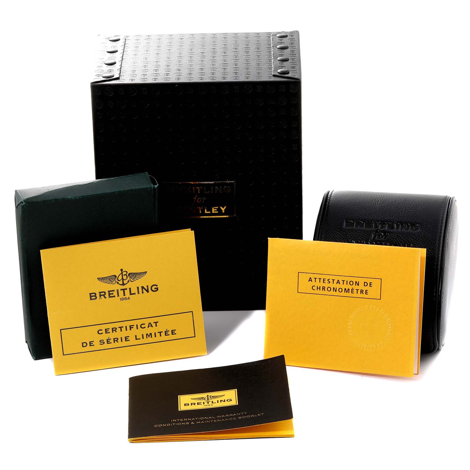 The image shows the packaging and documentation for the Bentley model by Breitling, including boxes and certificates.