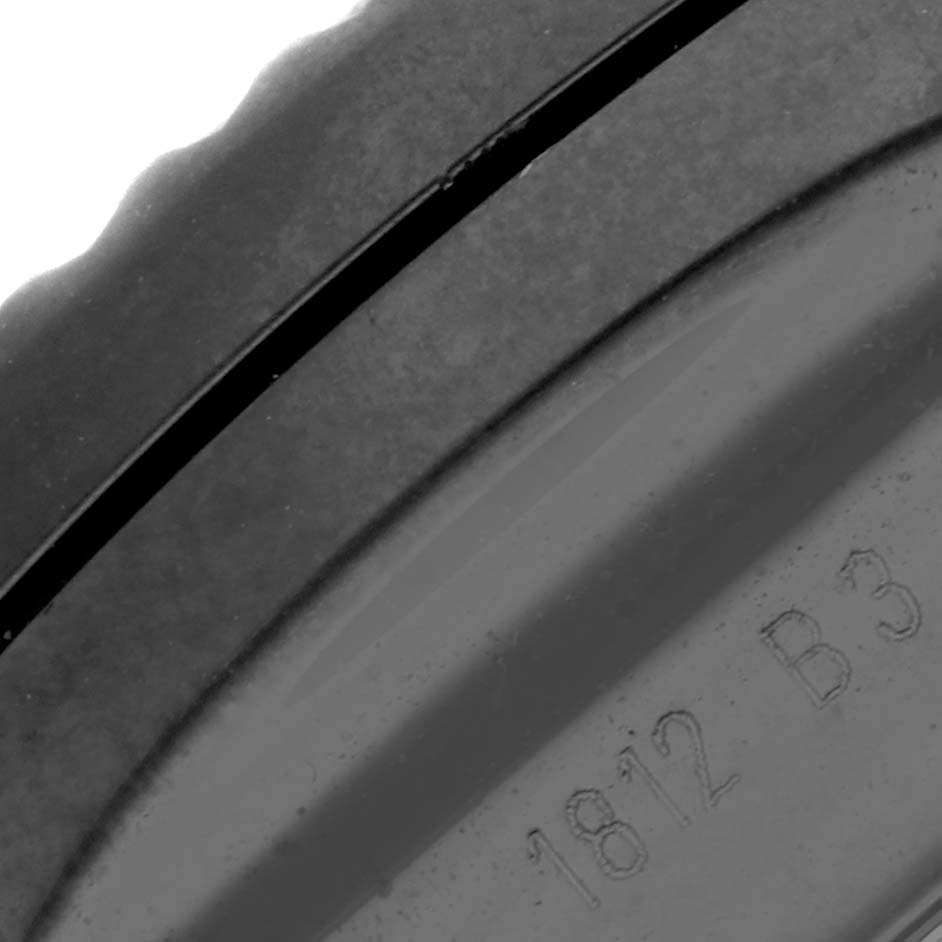 This close-up image shows the engraved side of a Bentley model by Breitling.
