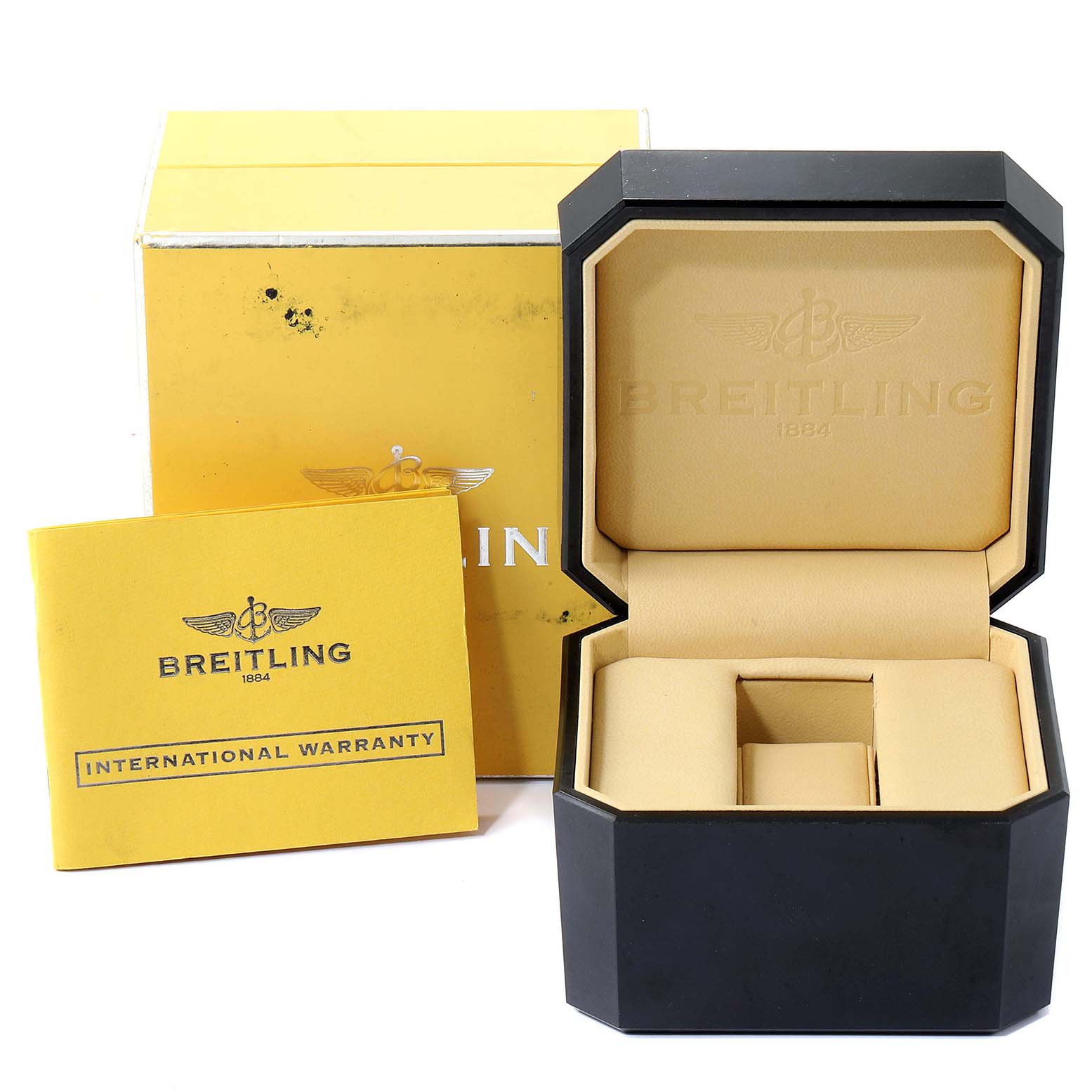 The image shows the case, box, and international warranty booklet for a Breitling Chronomat B13356 Men
s Steel and Gold (two tone) Black Dial B13356 Men
s Steel and Gold (two tone) Black Dial watch.