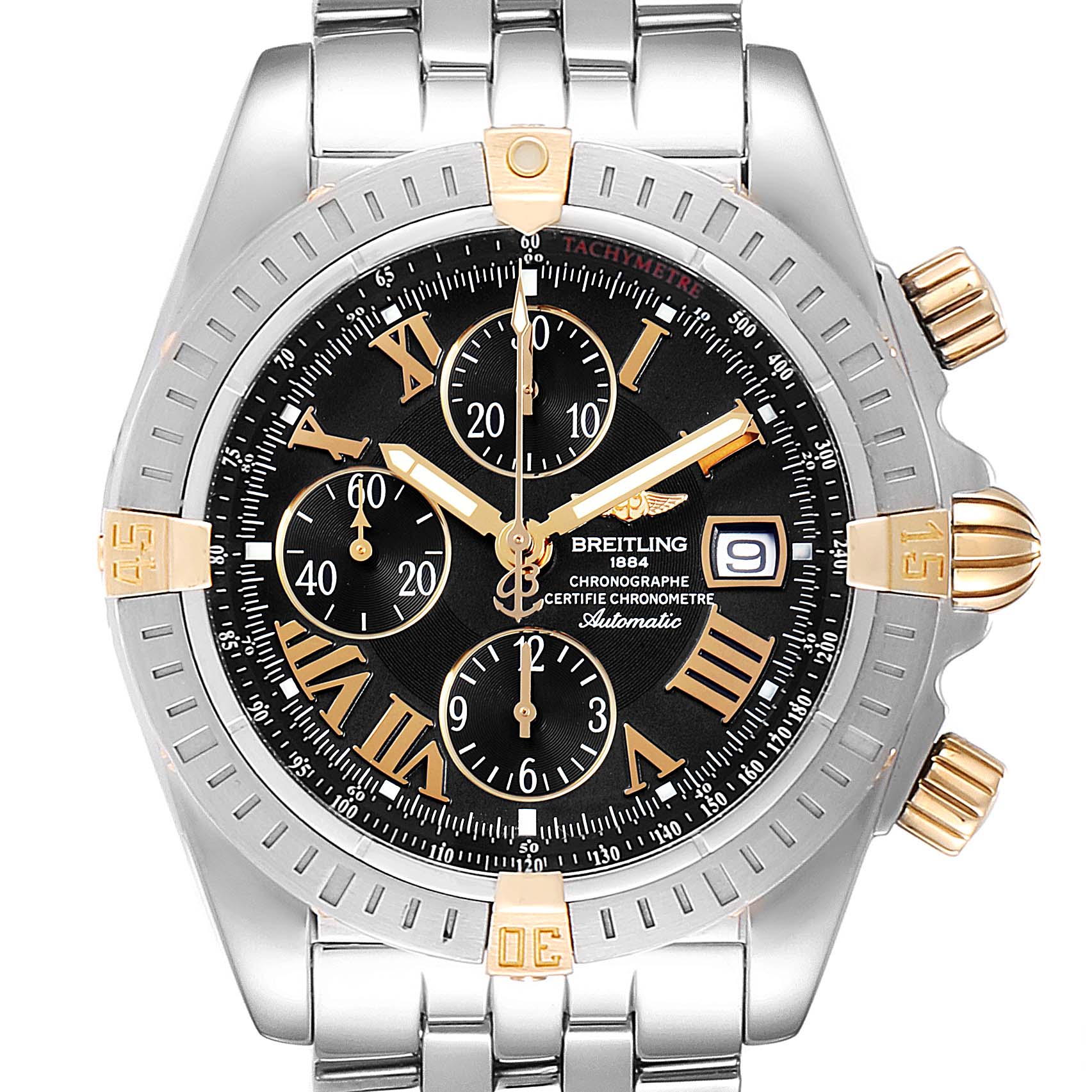 This image shows a front view of a Breitling Chronomat B13356 Men
s Steel and Gold (two tone) Black Dial B13356 Men
s Steel and Gold (two tone) Black Dial watch, highlighting its bezel, dial, sub-dials, and crown.