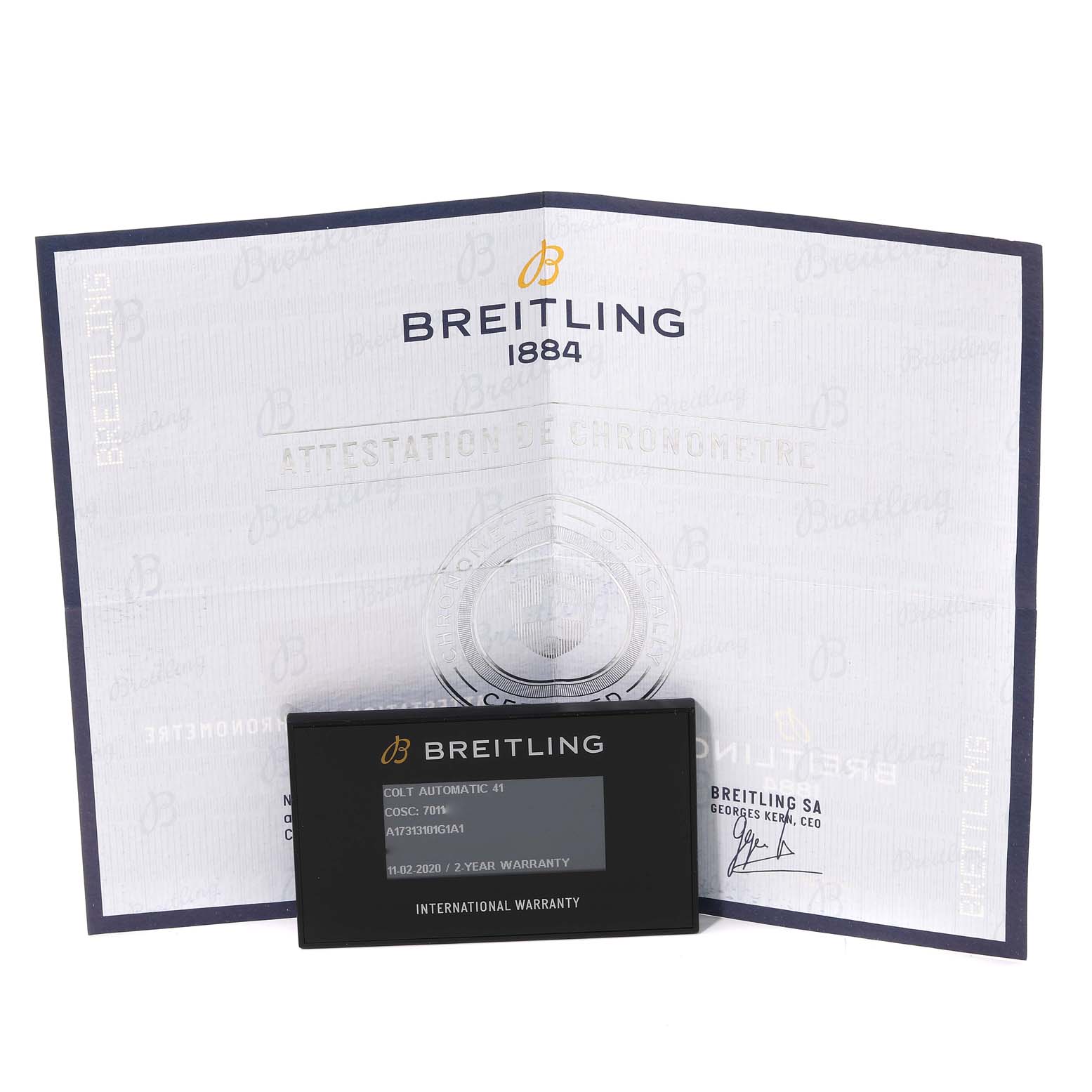 This image shows the warranty card and certificate for a Colt model by Breitling.