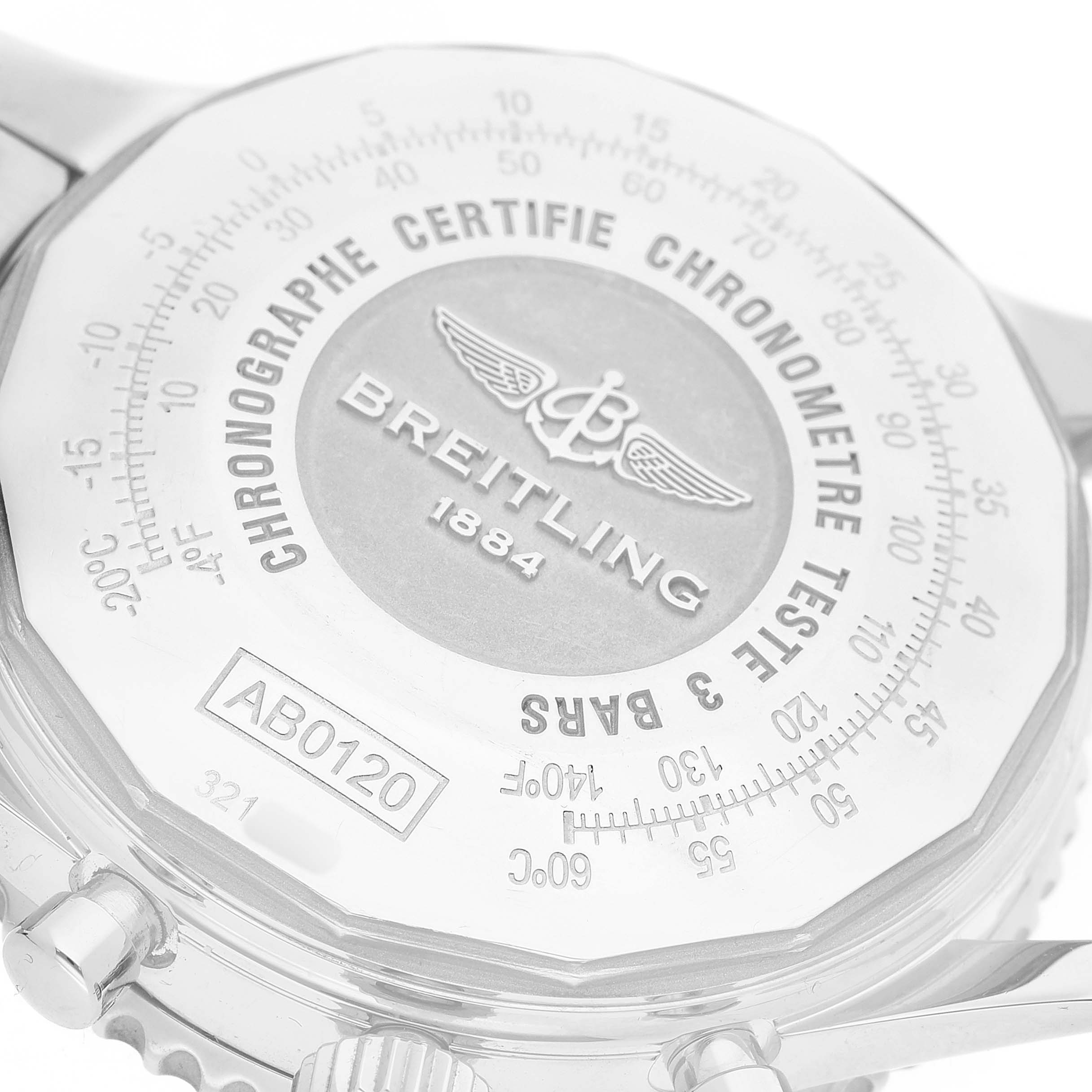 The image shows the back of a Breitling Navitimer AB012012/G826 Men's Stainless Steel Silver Dial watch, highlighting the engraved logo and chronometer certification.