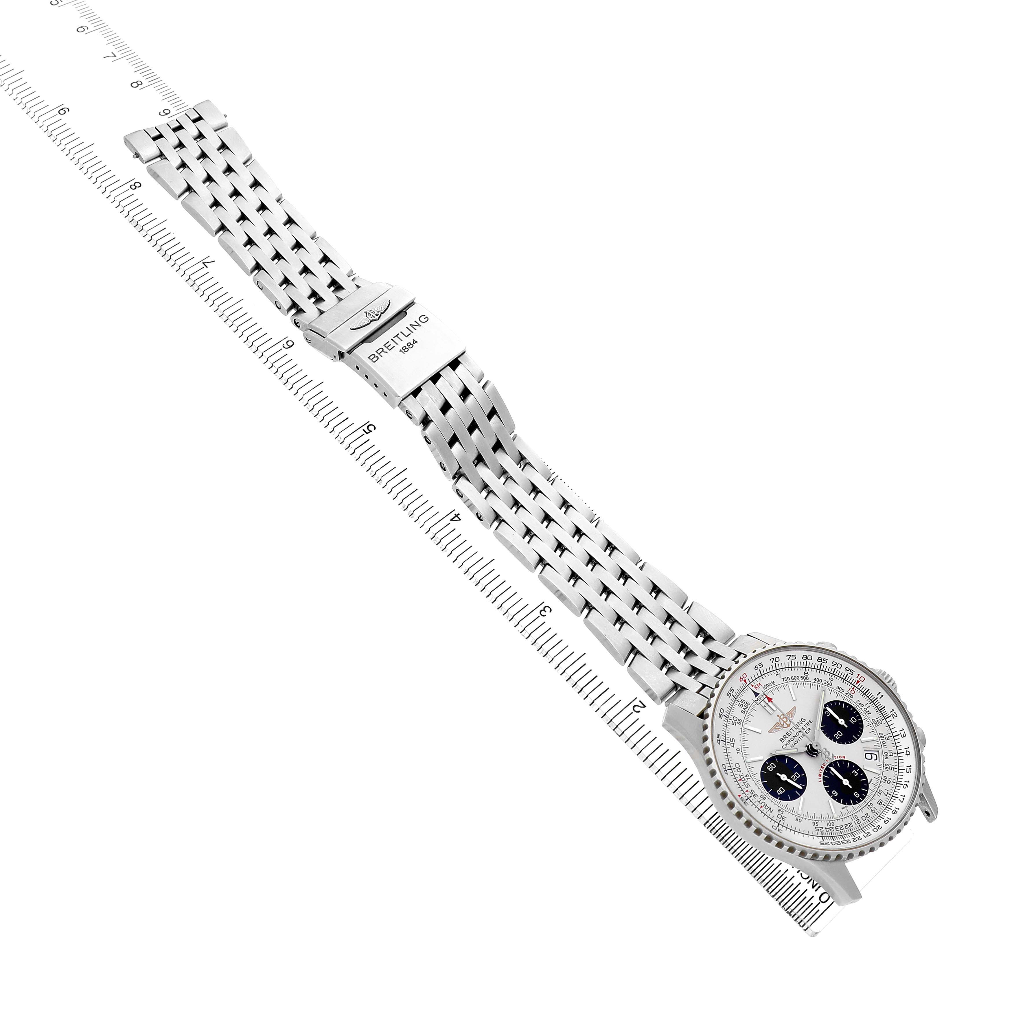 The Breitling Navitimer A23322 / A232G09NP Men's Stainless Steel Silver Dial watch is shown at a slight diagonal angle, featuring its face and full bracelet on display.