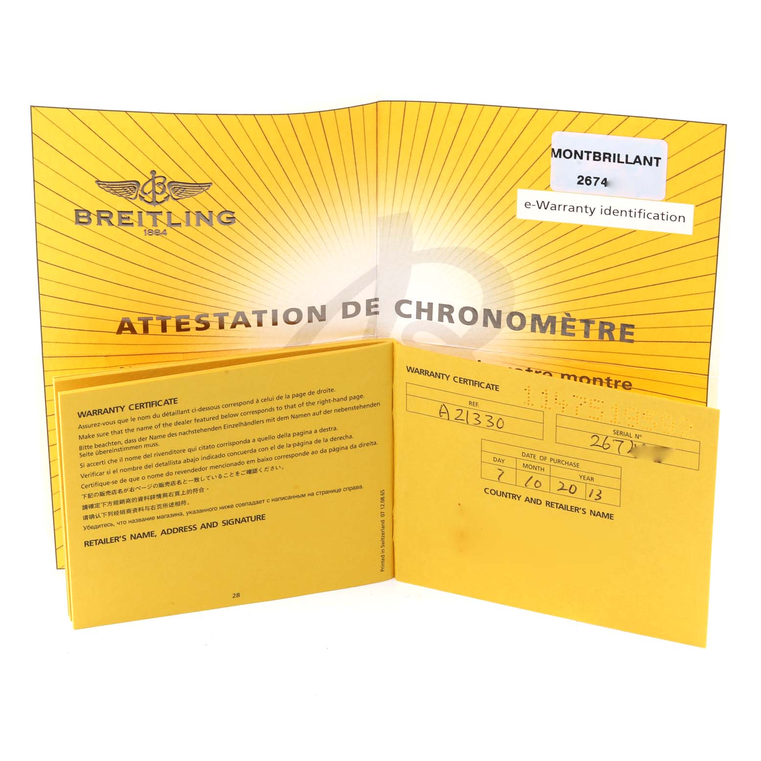 The image displays the open warranty certificate for a Breitling Navitimer A21330 Men
s Stainless Steel Black Dial A21330 Men
s Stainless Steel Black Dial watch, showcasing the yellow booklet and documentation.