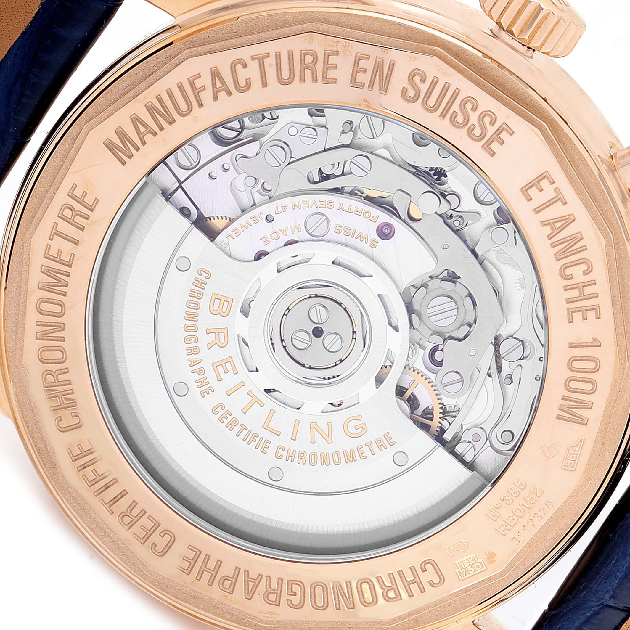 The image shows the back of the Breitling Transocean RB0152 Men's Rose Gold Silver Dial RB0152 Men's Rose Gold Silver Dial watch, highlighting its exposed movement and engravings.