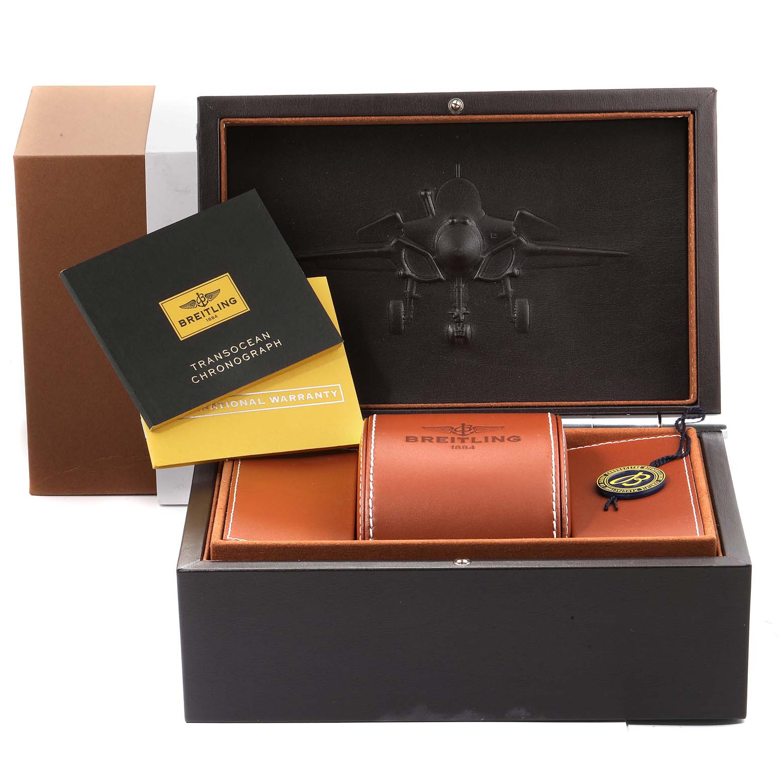 The image shows a Breitling Transocean RB0152 Men's Rose Gold Silver Dial RB0152 Men's Rose Gold Silver Dial watch box with a manual, warranty card, and a leather watch pouch.