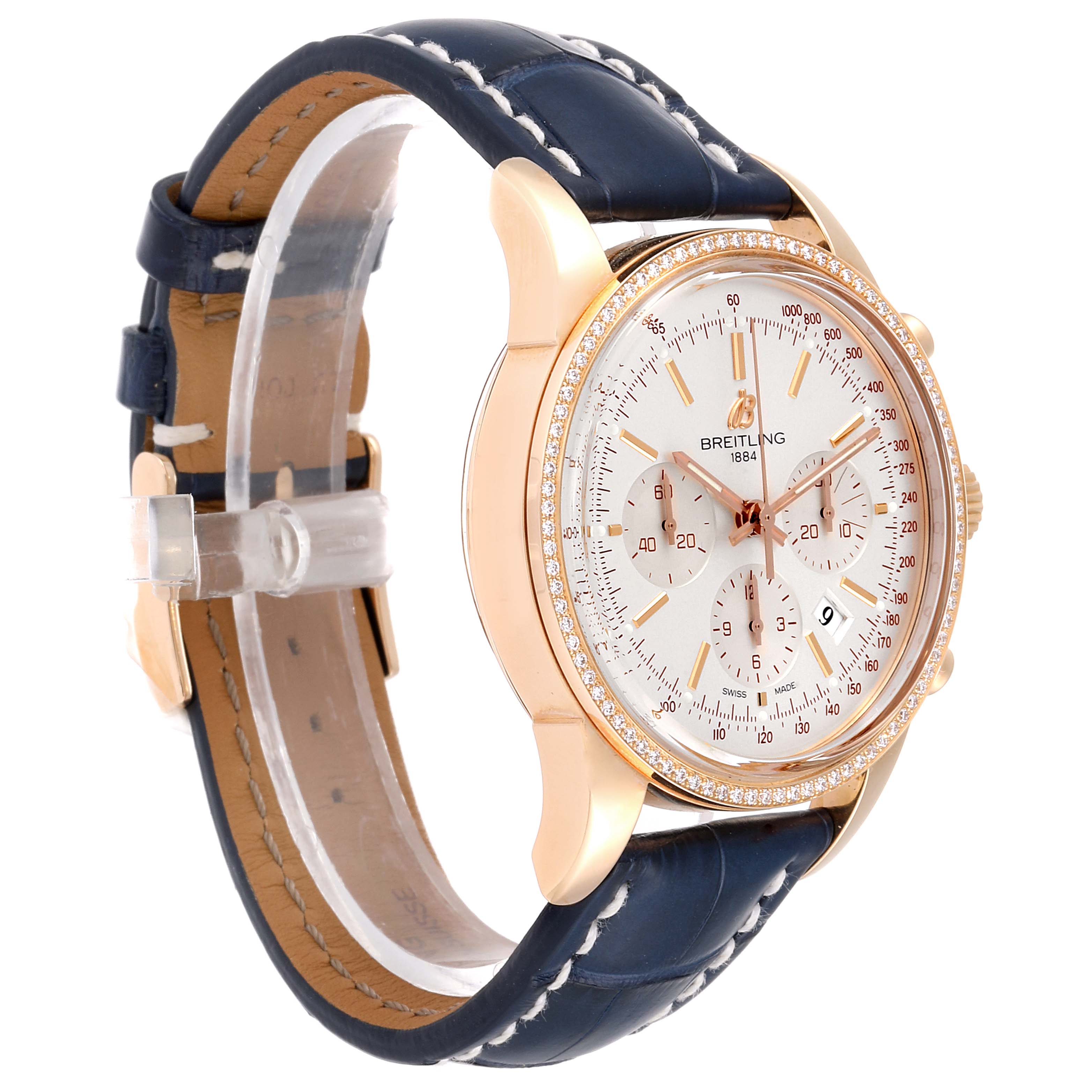 The Breitling Transocean RB0152 Men's Rose Gold Silver Dial RB0152 Men's Rose Gold Silver Dial watch is shown at a slight angle, displaying its face, crown, side buttons, and leather strap.