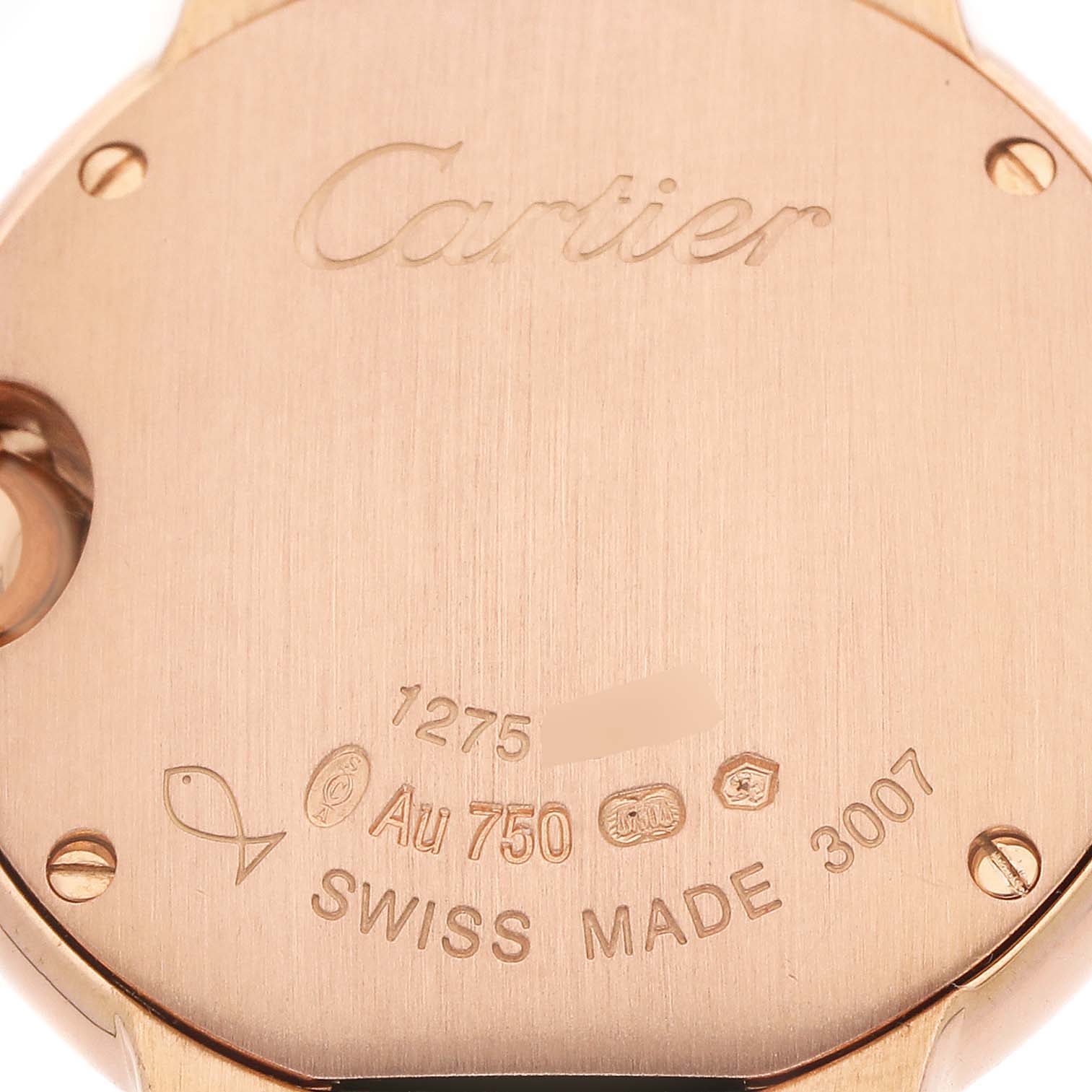 The image shows the back case of a Cartier Ballon Bleu WE900251 Women's Rose Gold Silver Dial watch, highlighting engravings and hallmarks.