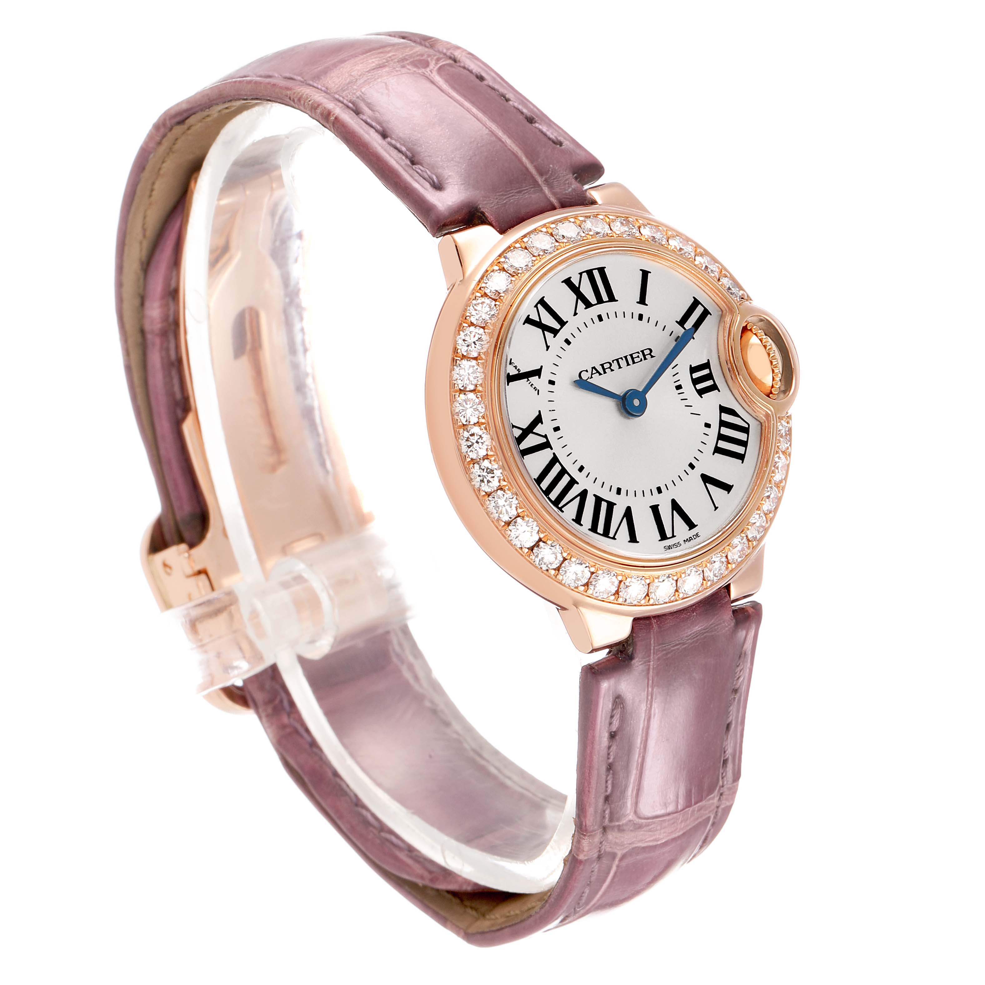 The Cartier Ballon Bleu WE900251 Women's Rose Gold Silver Dial watch is shown at an angle highlighting the round face, Roman numerals, diamond bezel, and purple strap.