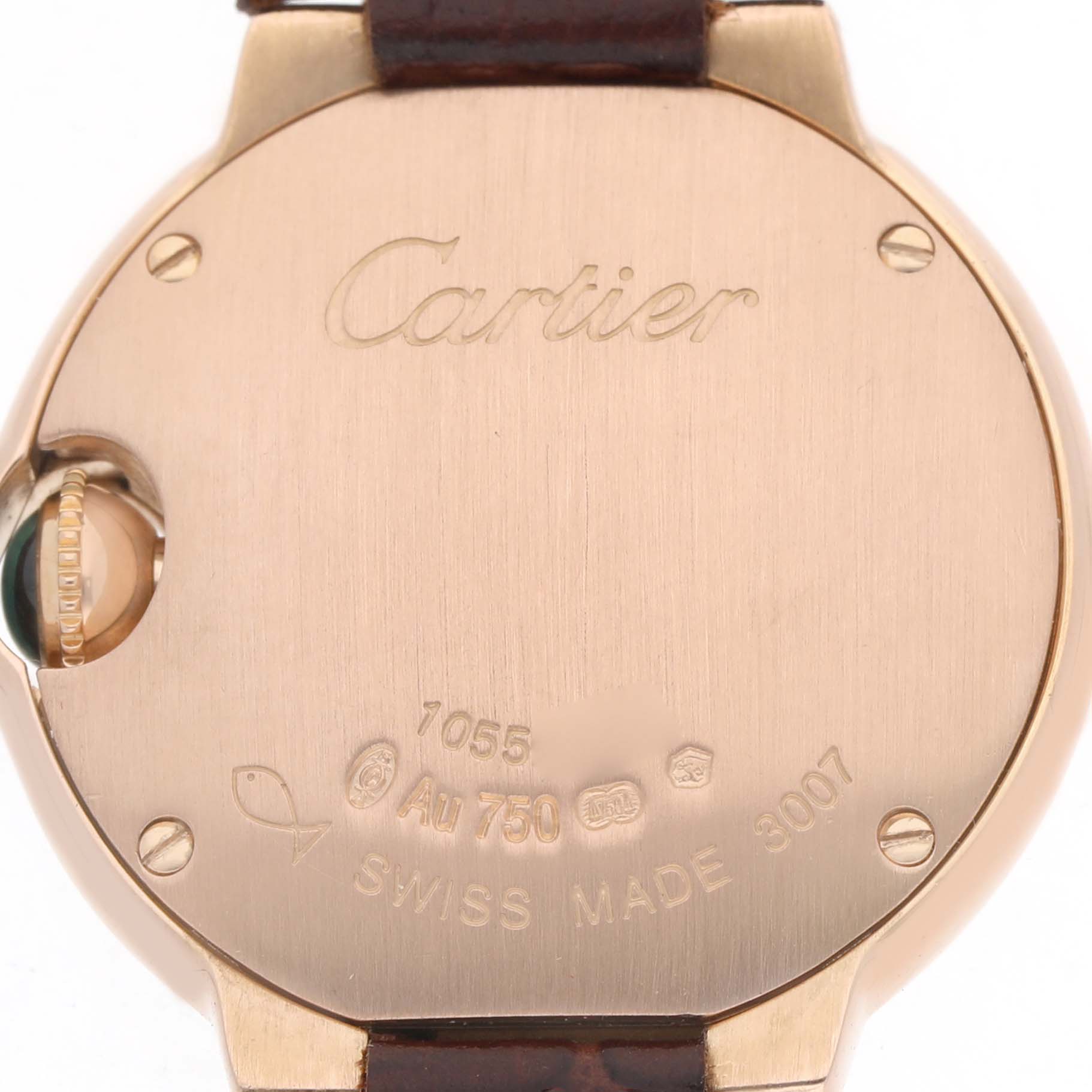 The image shows the back case of a Cartier Ballon Bleu WE900251 Women's Rose Gold Silver Dial watch, highlighting engravings and part of the strap attachment.
