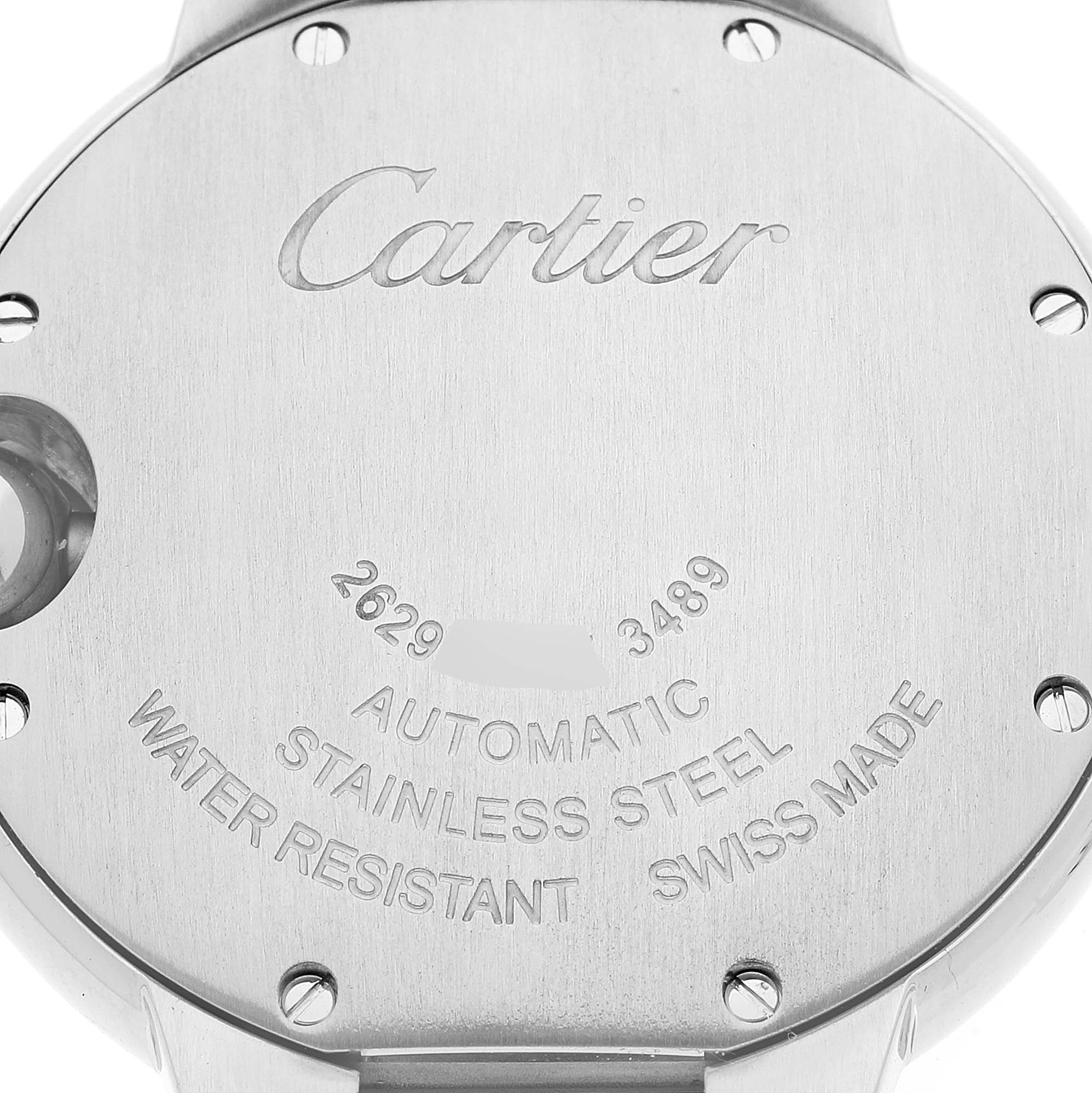 The image shows the back case of a Ballon Bleu model by Cartier, highlighting the engraving and material details.