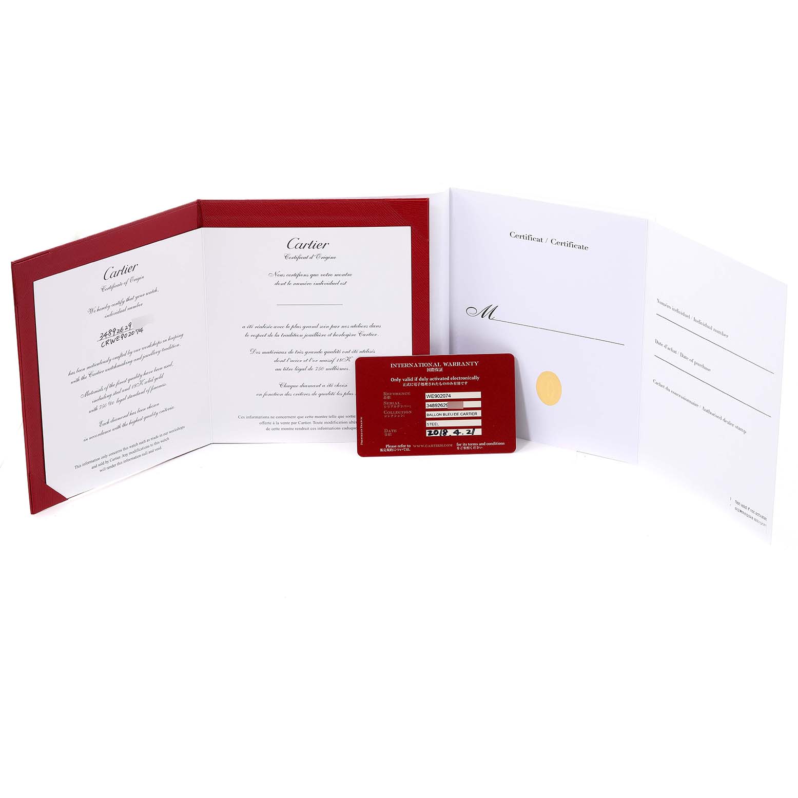 The image shows the warranty card and documents for the Ballon Bleu model by Cartier, displayed from a top-down angle.