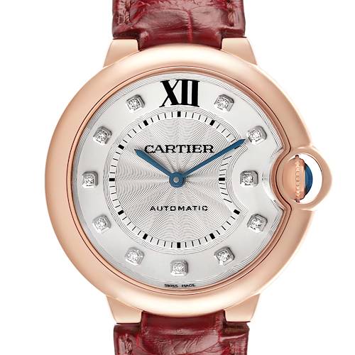 The Cartier Ballon Bleu WJBB0010 Women's Rose Gold Silver Dial watch is shown from the front, highlighting the dial, case, crown, and part of the strap.