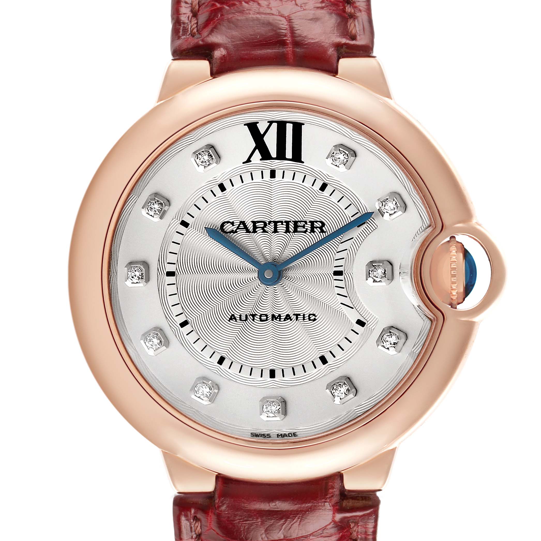 The image shows a close-up of the Cartier Ballon Bleu WJBB0010 Women's Rose Gold Silver Dial watch, highlighting its dial, blue hands, and crown with a sapphire.