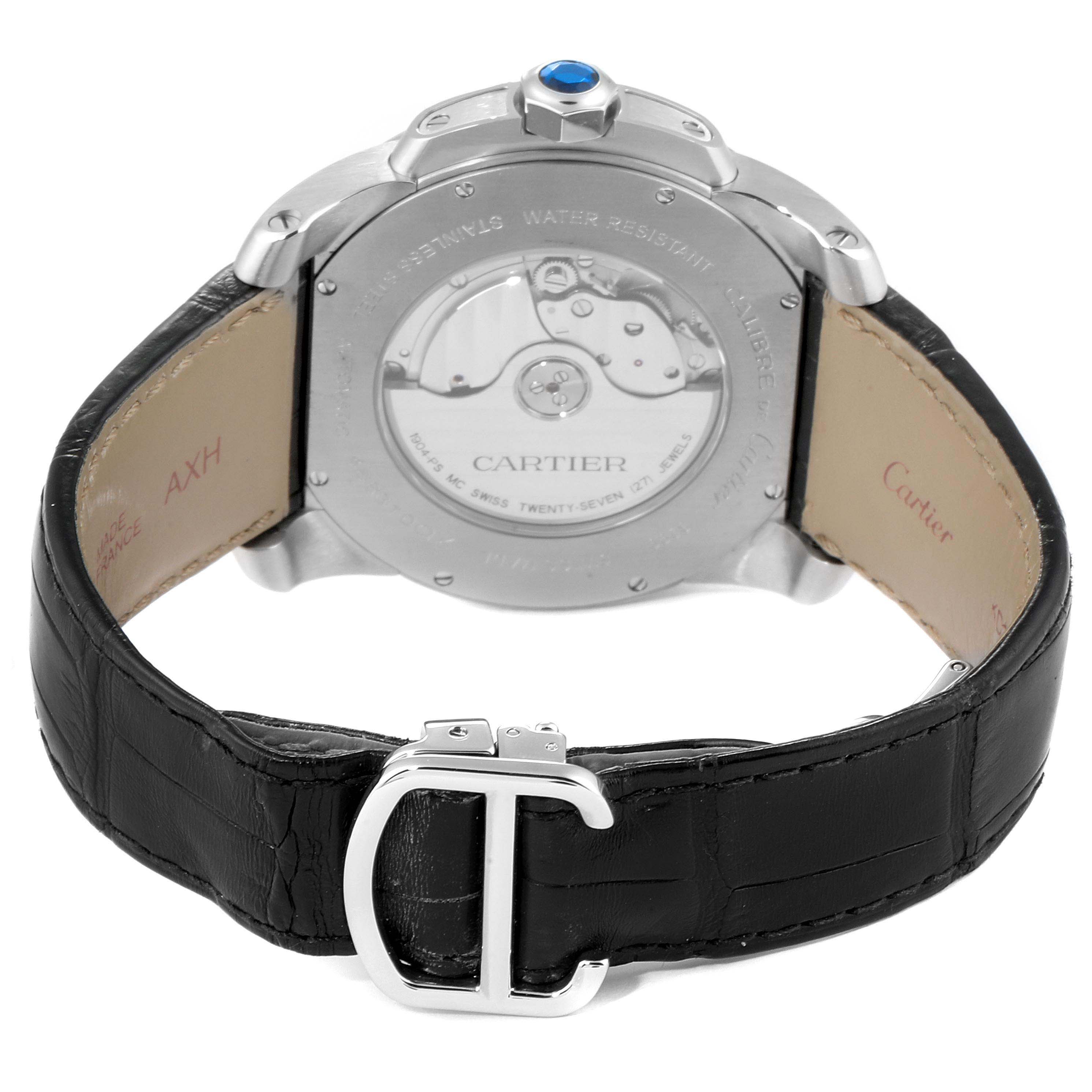 The image shows the back view of a Calibre de Cartier watch by Cartier, highlighting the leather strap and buckle.