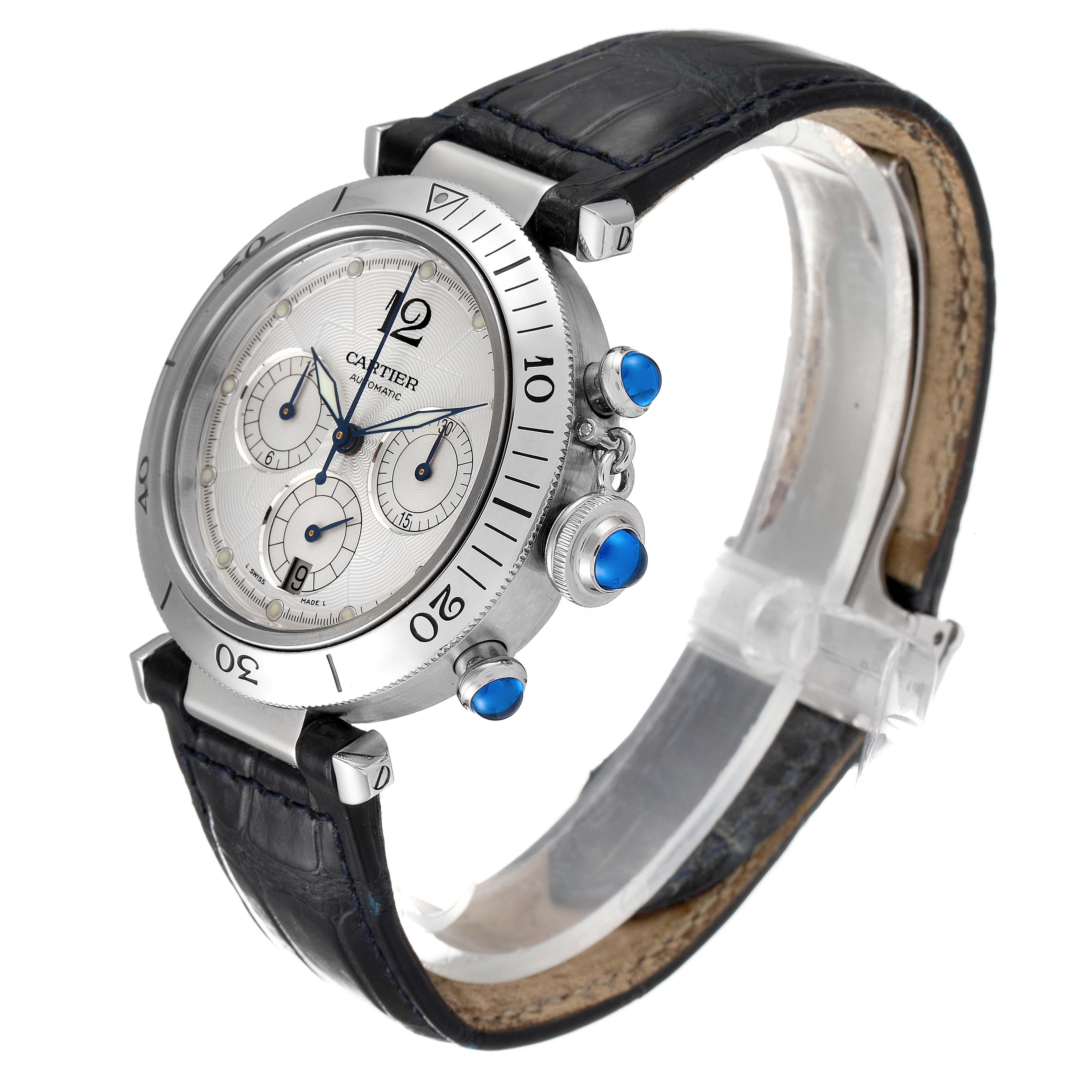 This image shows a side angle of a Cartier Pasha W3103055 Men's Stainless Steel Silver Dial W3103055 Men's Stainless Steel Silver Dial watch, highlighting the face, bezel, and blue-tipped crown and pushers.