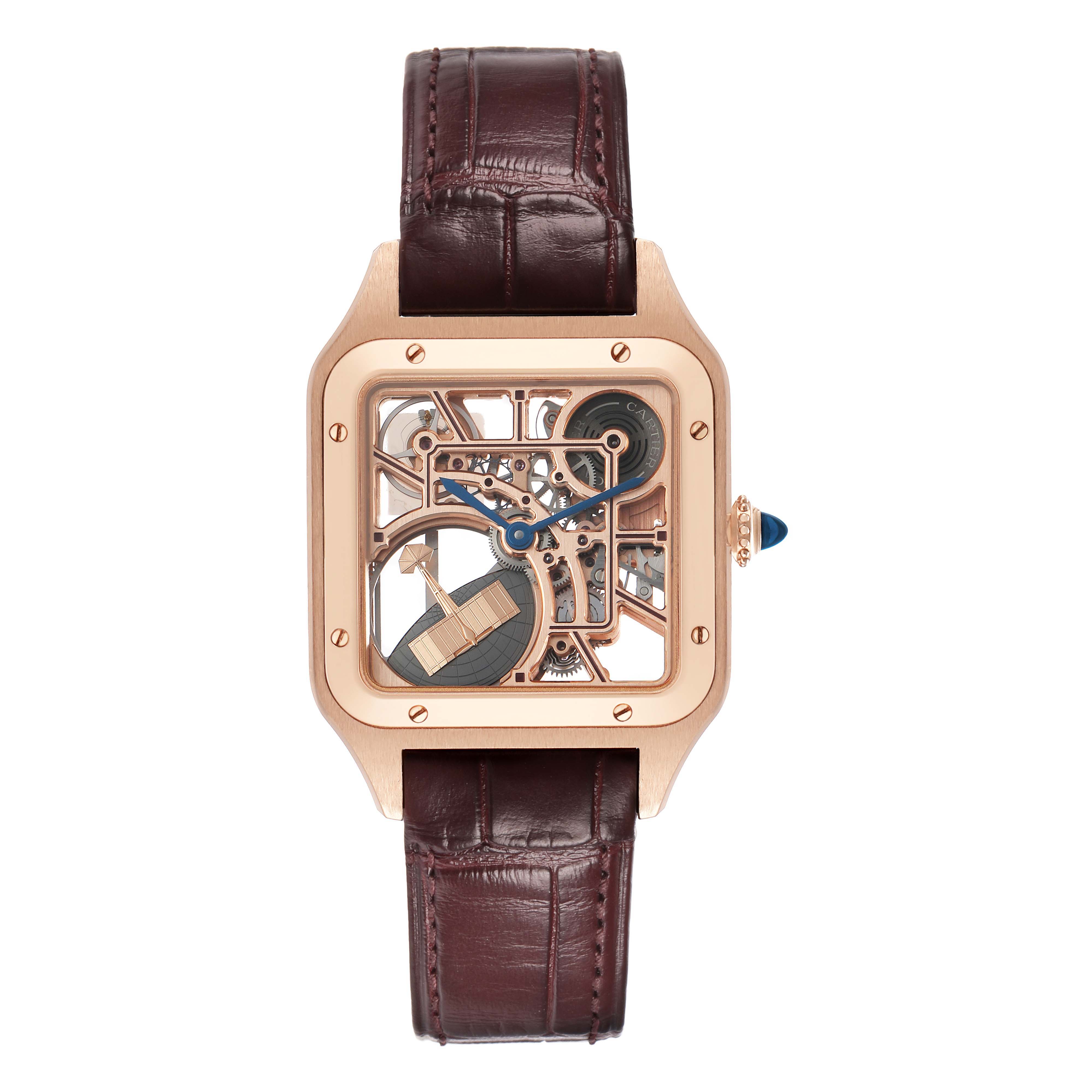 The Cartier Santos Dumont WHSA0030 Men's Rose Gold Transparent Dial watch is shown from a top-down angle, highlighting its skeleton dial and brown leather strap.