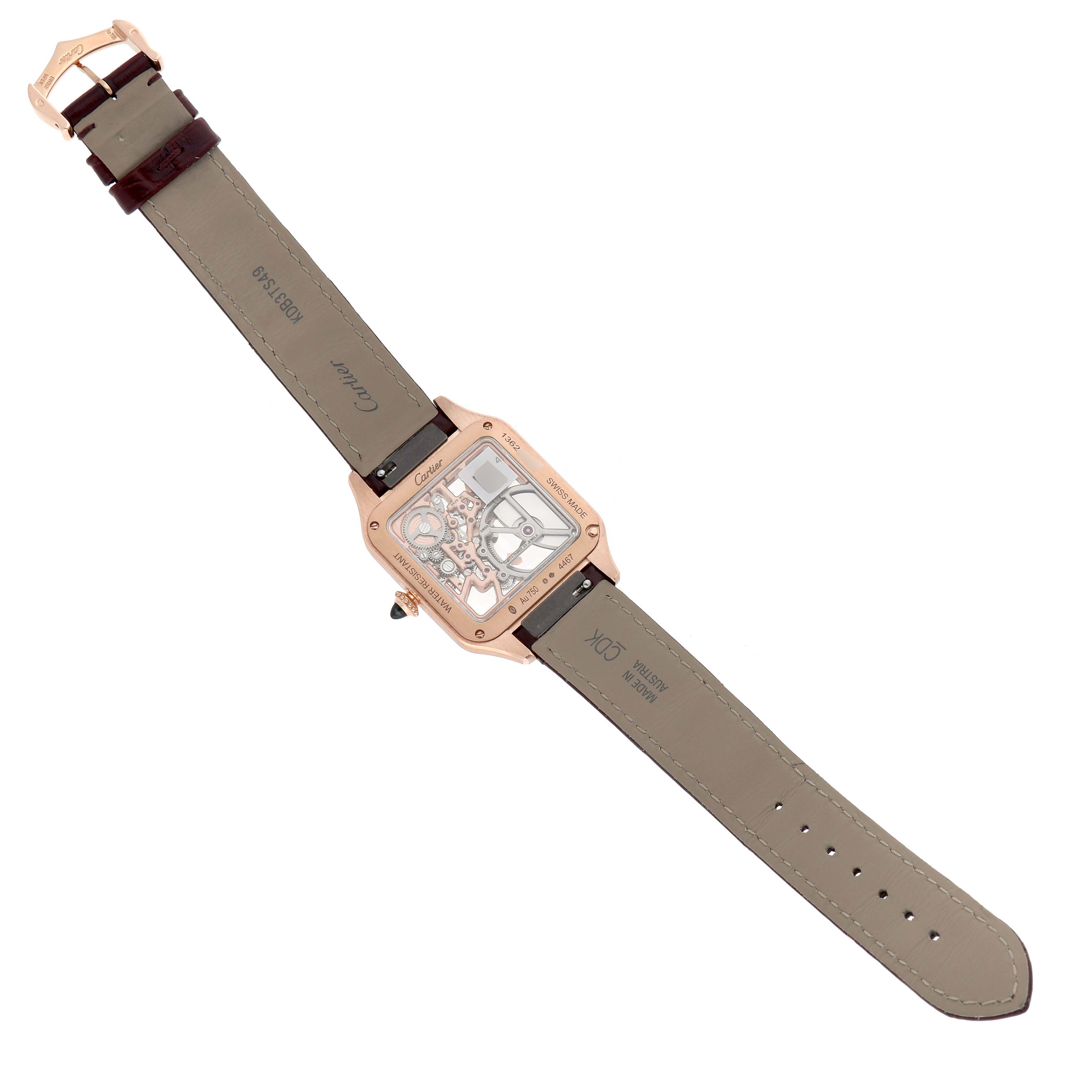 The Cartier Santos Dumont WHSA0030 Men's Rose Gold Transparent Dial watch is shown from the back, displaying its transparent case and leather strap.