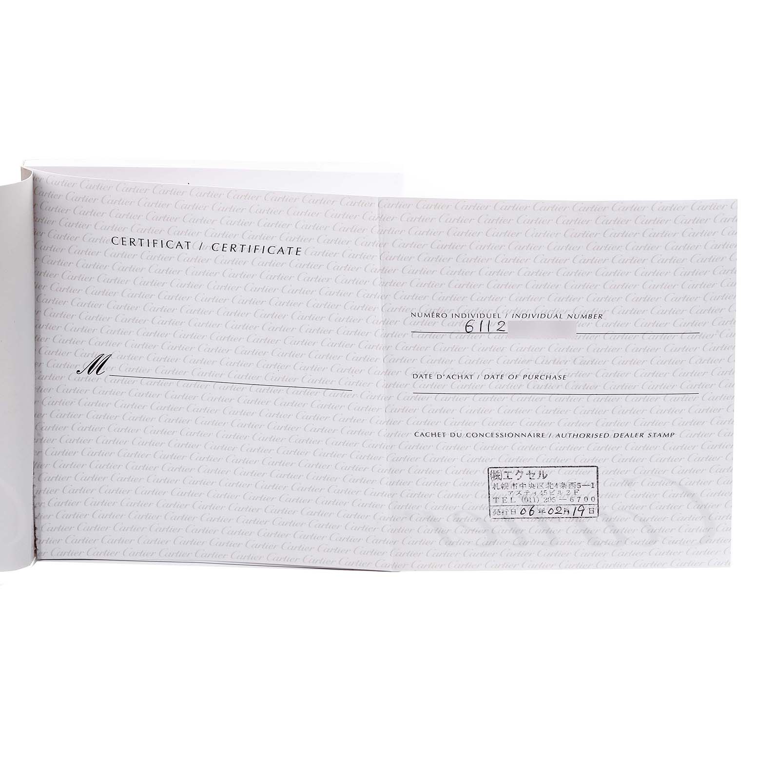 The image shows the certificate booklet for a Santos model by Cartier, displaying purchase information and dealer stamp.
