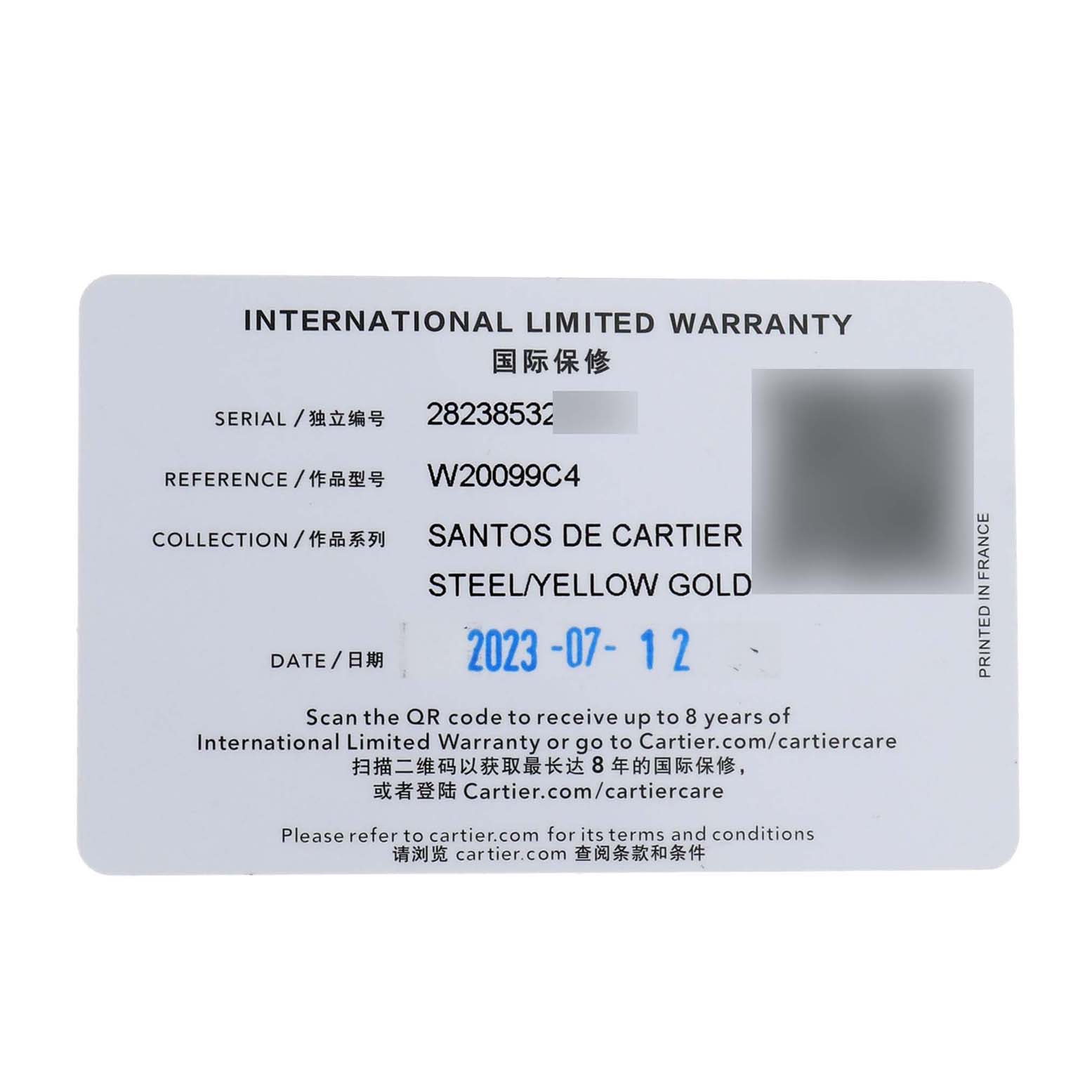 The image shows an international limited warranty card for a Santos de Cartier watch, indicating steel/yellow gold.
