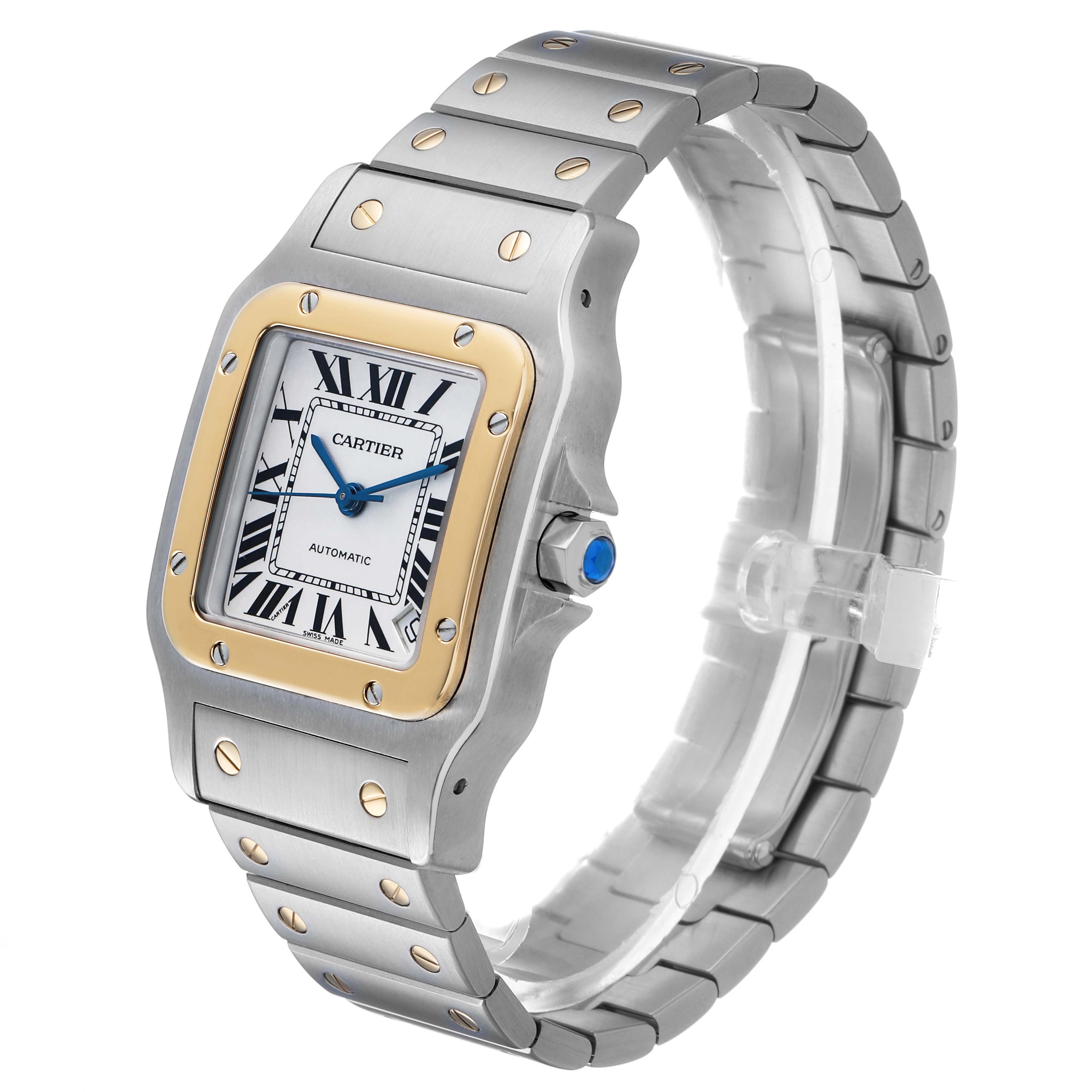 The Cartier Santos W20099C4 Men's Stainless Steel Silver Dial watch is shown from a three-quarter angle, highlighting its face, bezel, crown, and bracelet.
