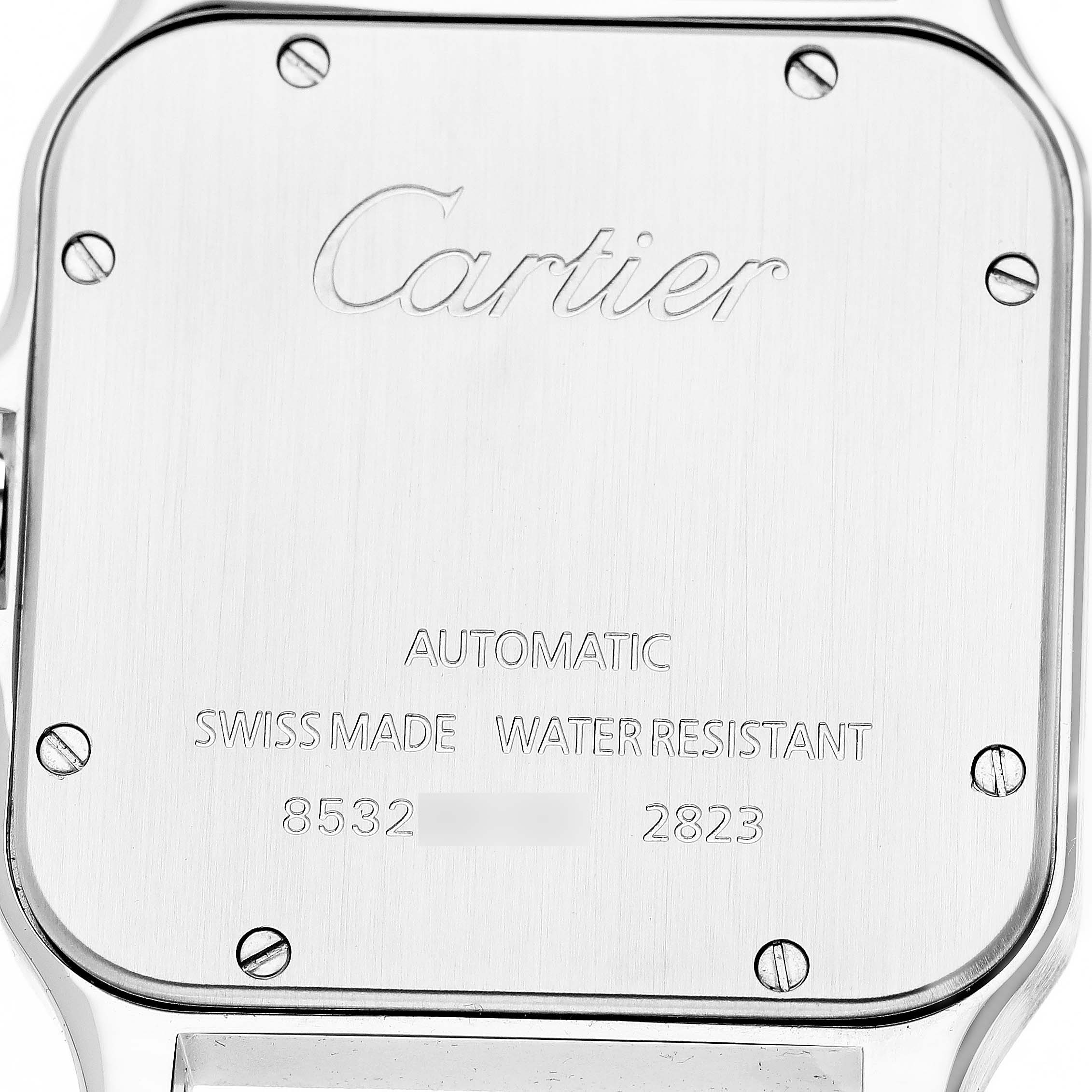 This image shows the back case of a Cartier Santos W20099C4 Men's Stainless Steel Silver Dial model, displaying engravings and screws.