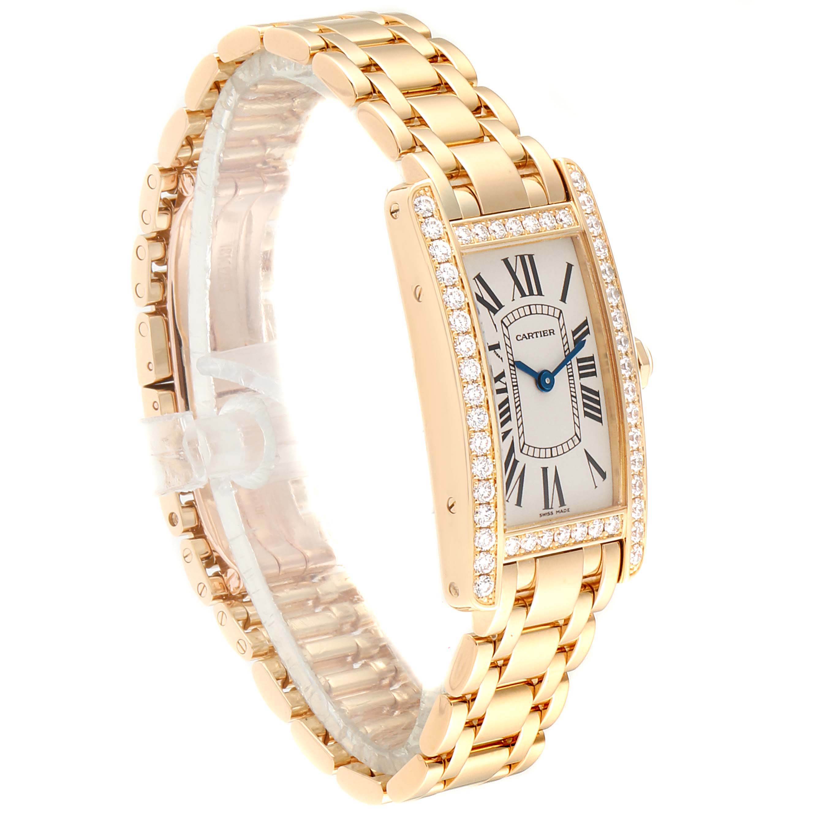 This image shows a Cartier Tank Americaine WB7072K2 Women's Yellow Gold Silver Dial WB7072K2 Women's Yellow Gold Silver Dial watch at a three-quarter angle, revealing the face, bracelet, and diamond-studded bezel.