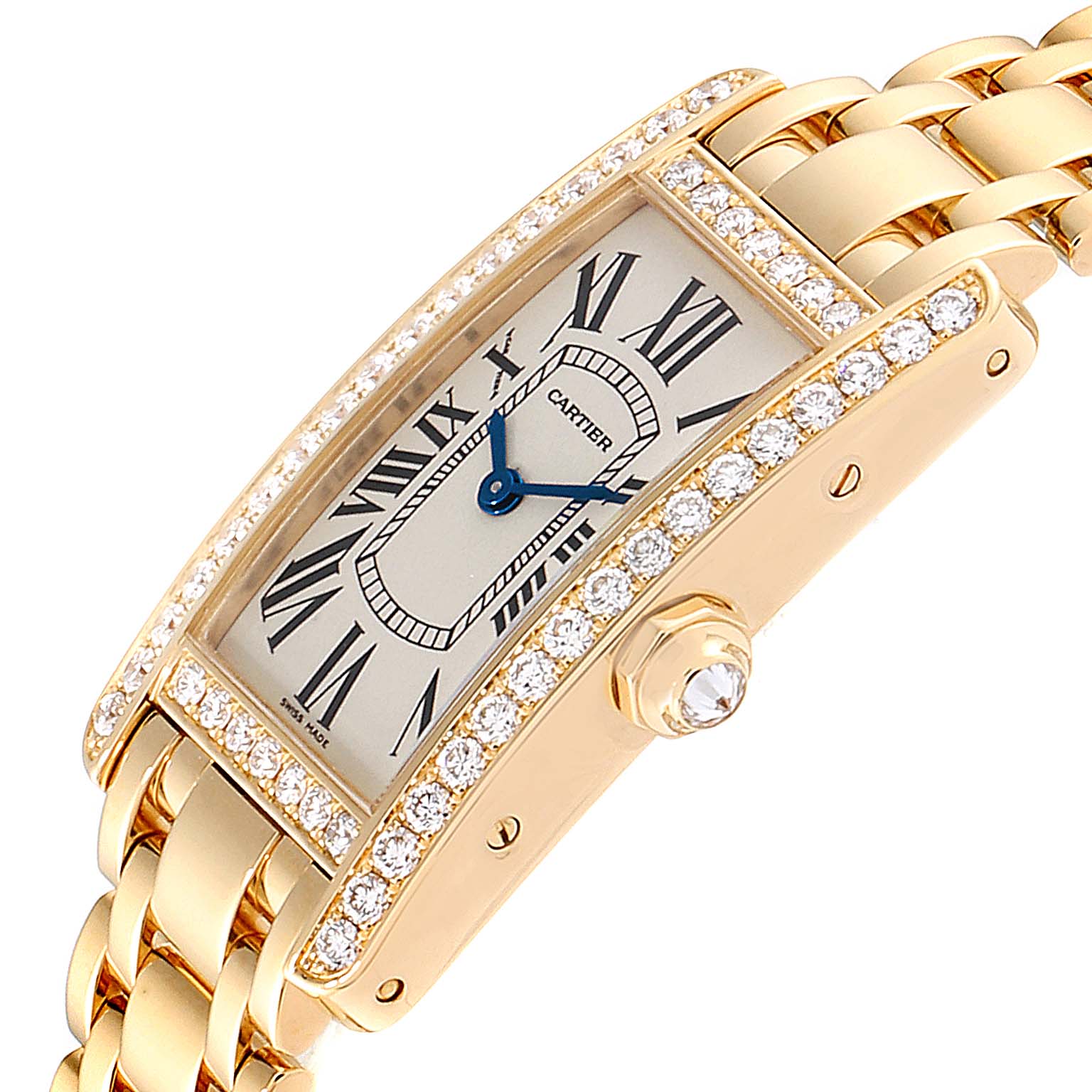 The image showcases a Cartier Tank Americaine WB7072K2 Women's Yellow Gold Silver Dial WB7072K2 Women's Yellow Gold Silver Dial watch from an angled top view, highlighting its diamond-encrusted case and bracelet.
