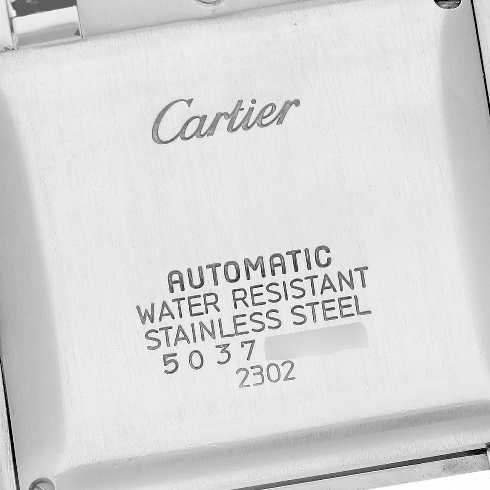 This image shows the back case of a Cartier Tank Française watch, displaying the brand name and specifications.