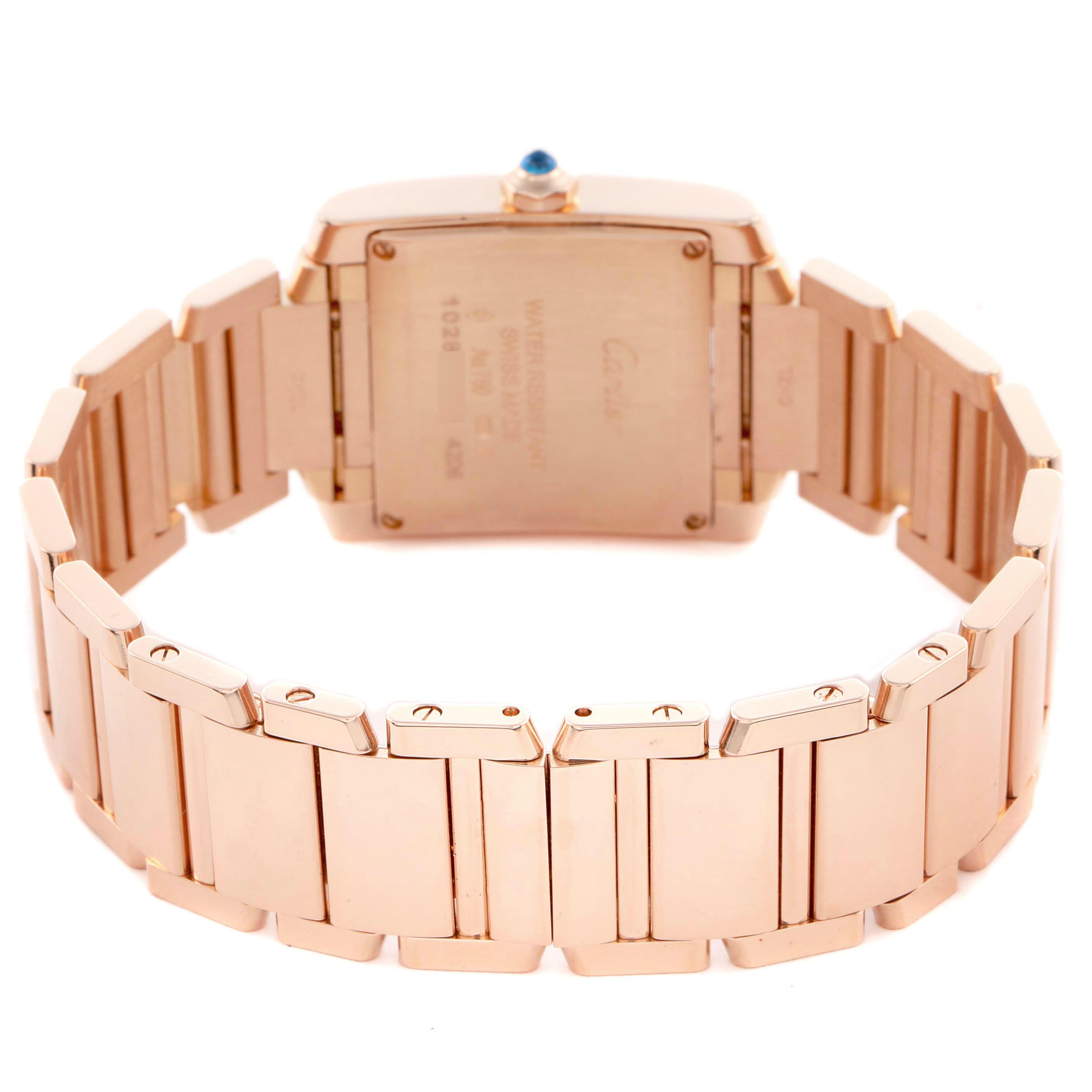 The image shows the back case and bracelet of a Cartier Tank Francaise WGTA0030 Women
s Rose Gold Silver Dial WGTA0030 Women
s Rose Gold Silver Dial watch, highlighting the clasp and links.