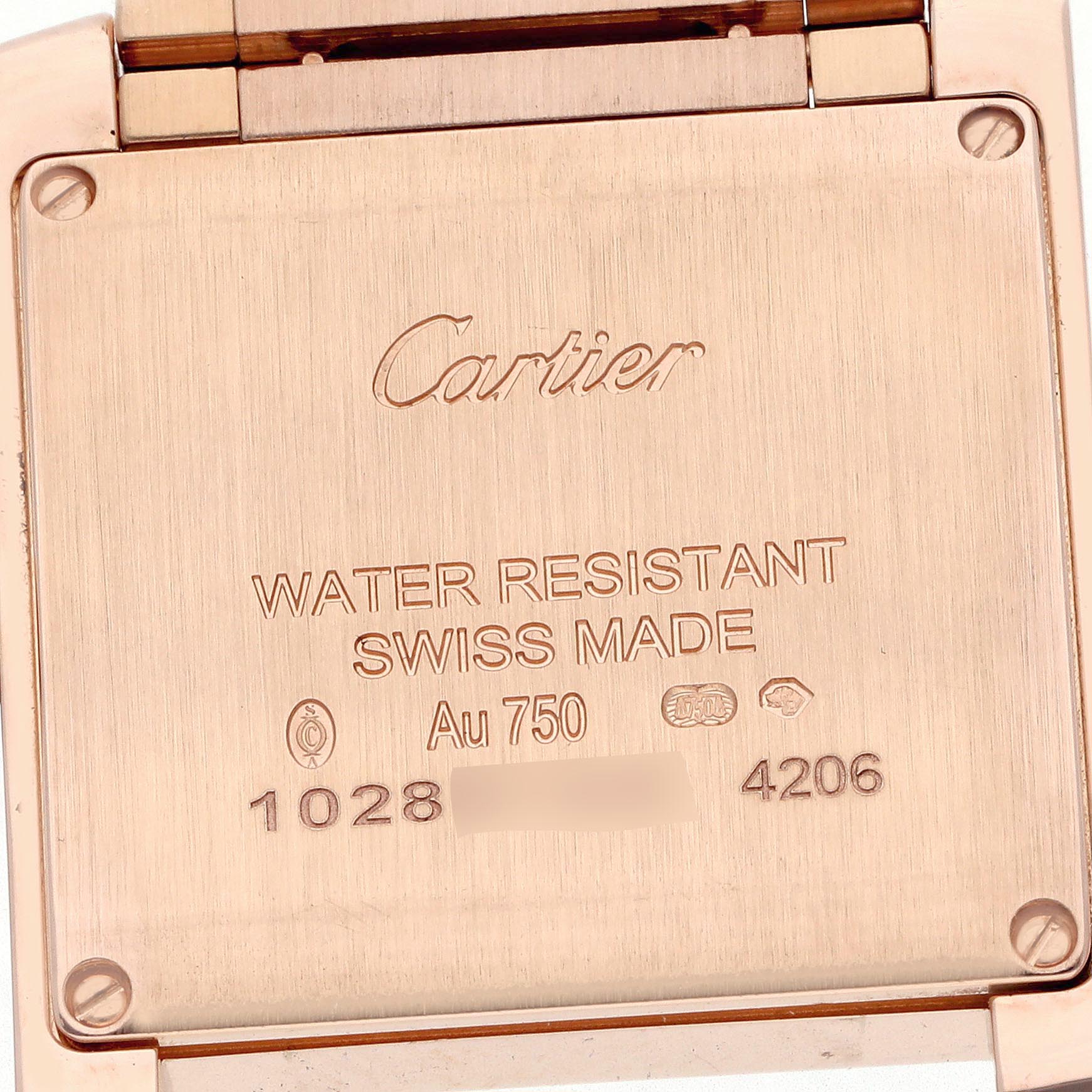 The image shows the back of the Cartier Tank Française watch, displaying engravings and specifications.