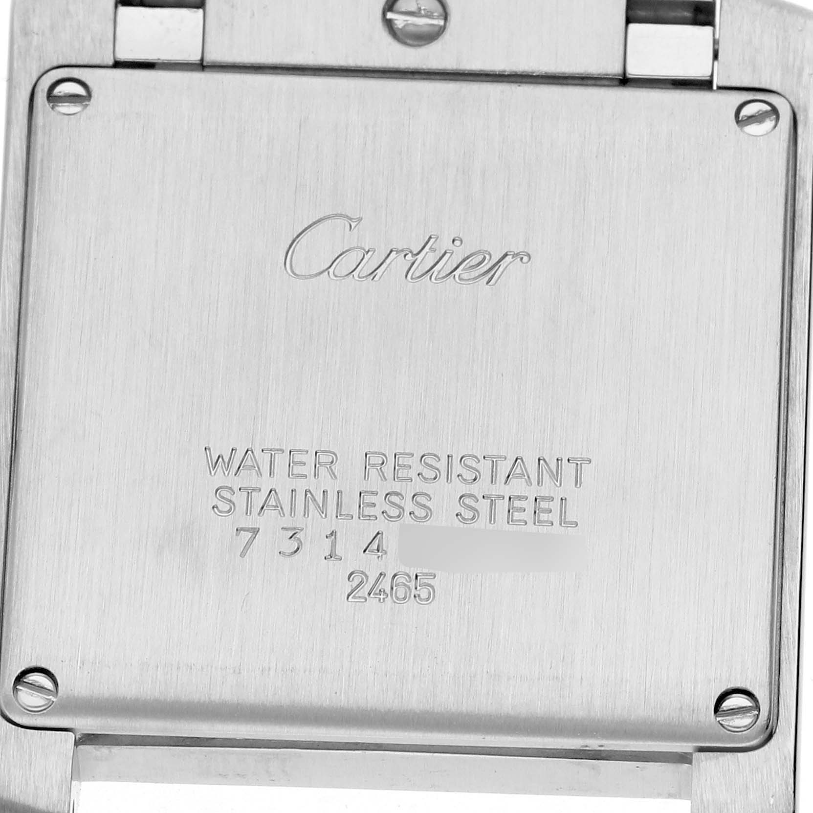 The image shows the back of a Cartier Tank Francaise W51012Q4 Women's Stainless Steel Silver Dial watch, highlighting the engraved brand name and specifications.