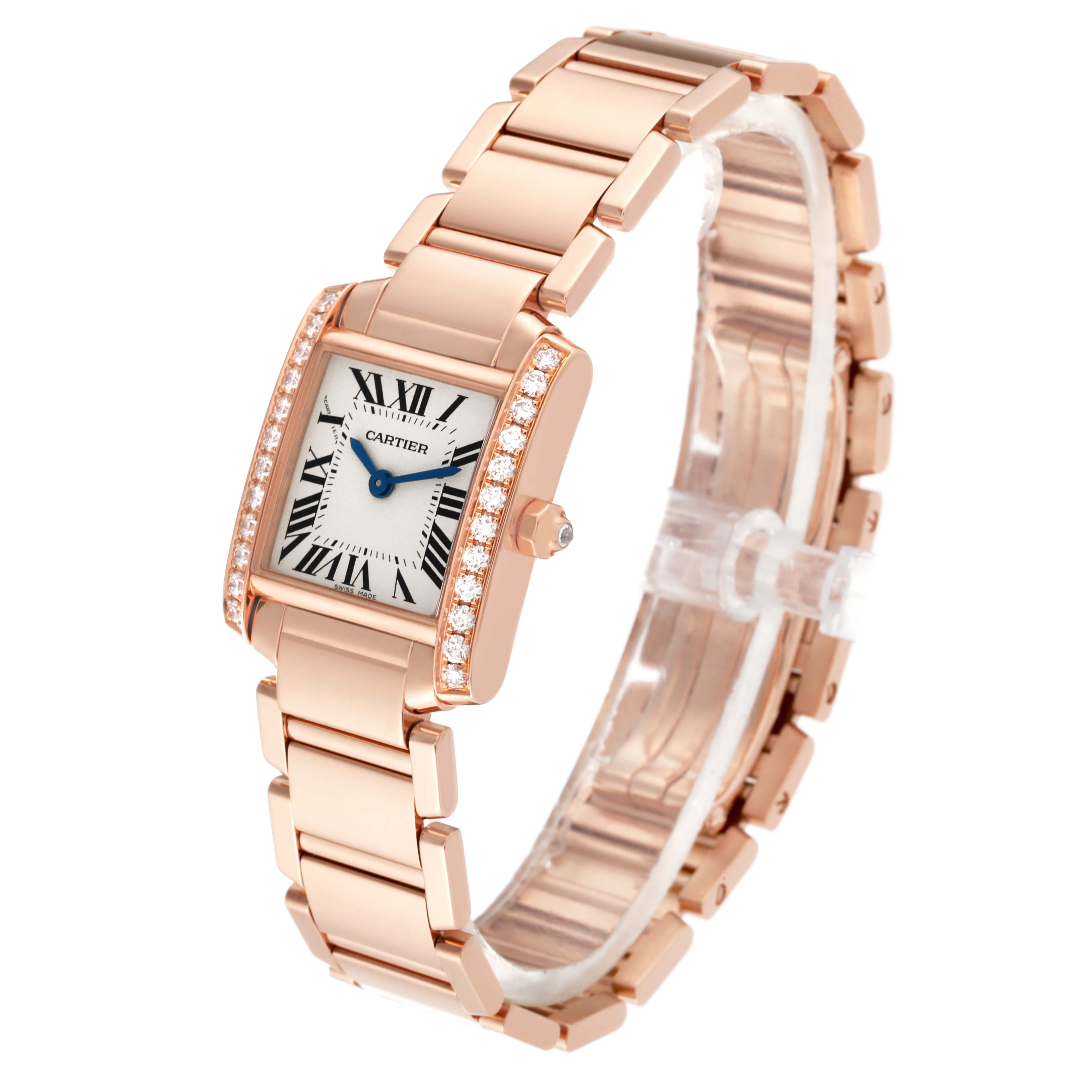 The image shows a Cartier Tank Francaise WJTA0022 Women
s Rose Gold Silver Dial WJTA0022 Women
s Rose Gold Silver Dial watch angled to display the face, bracelet, side profile, and diamond-studded bezel.
