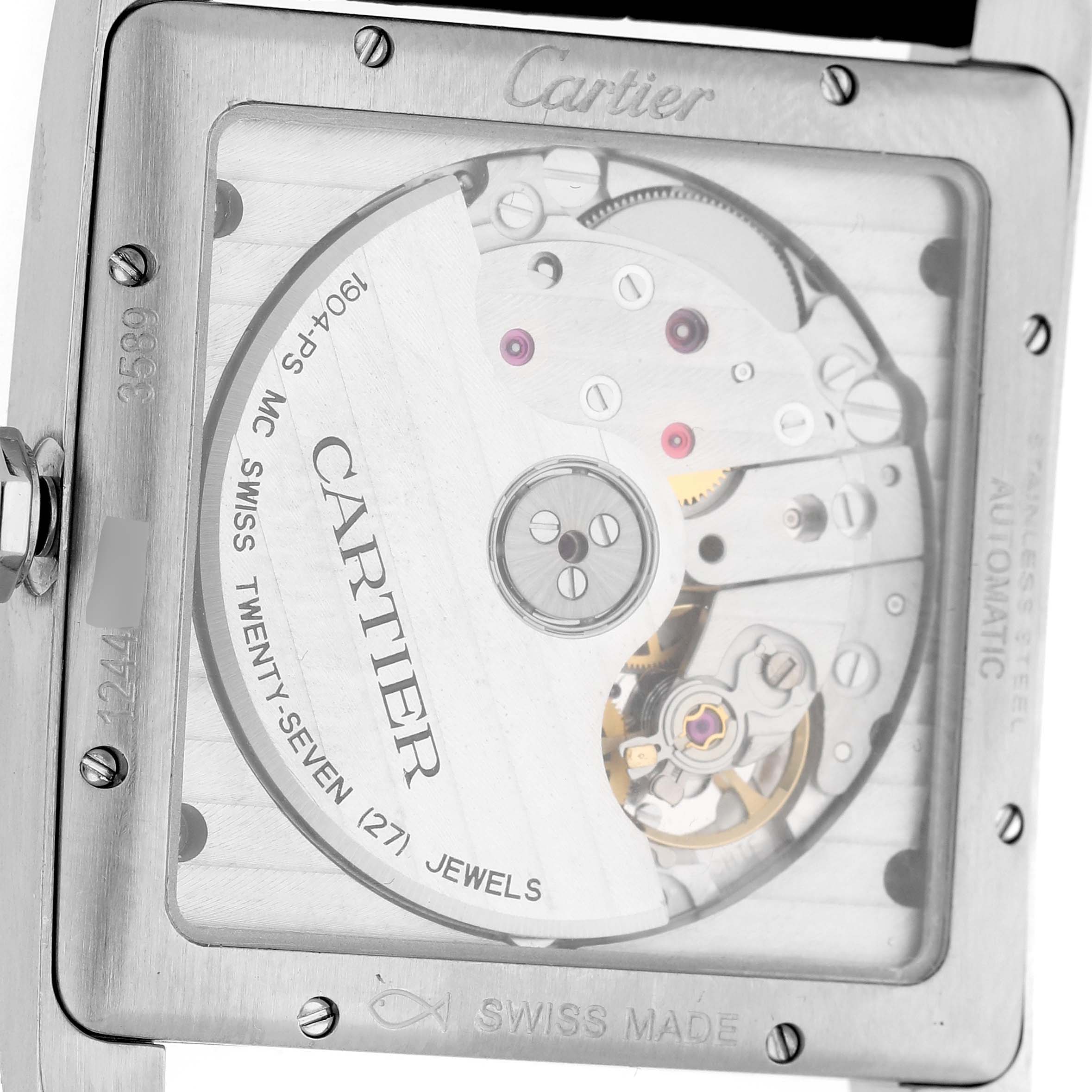 The image shows the back view of a Cartier Tank MC W5330004 Men's Stainless Steel Black Dial watch, highlighting its movement and internal mechanisms.