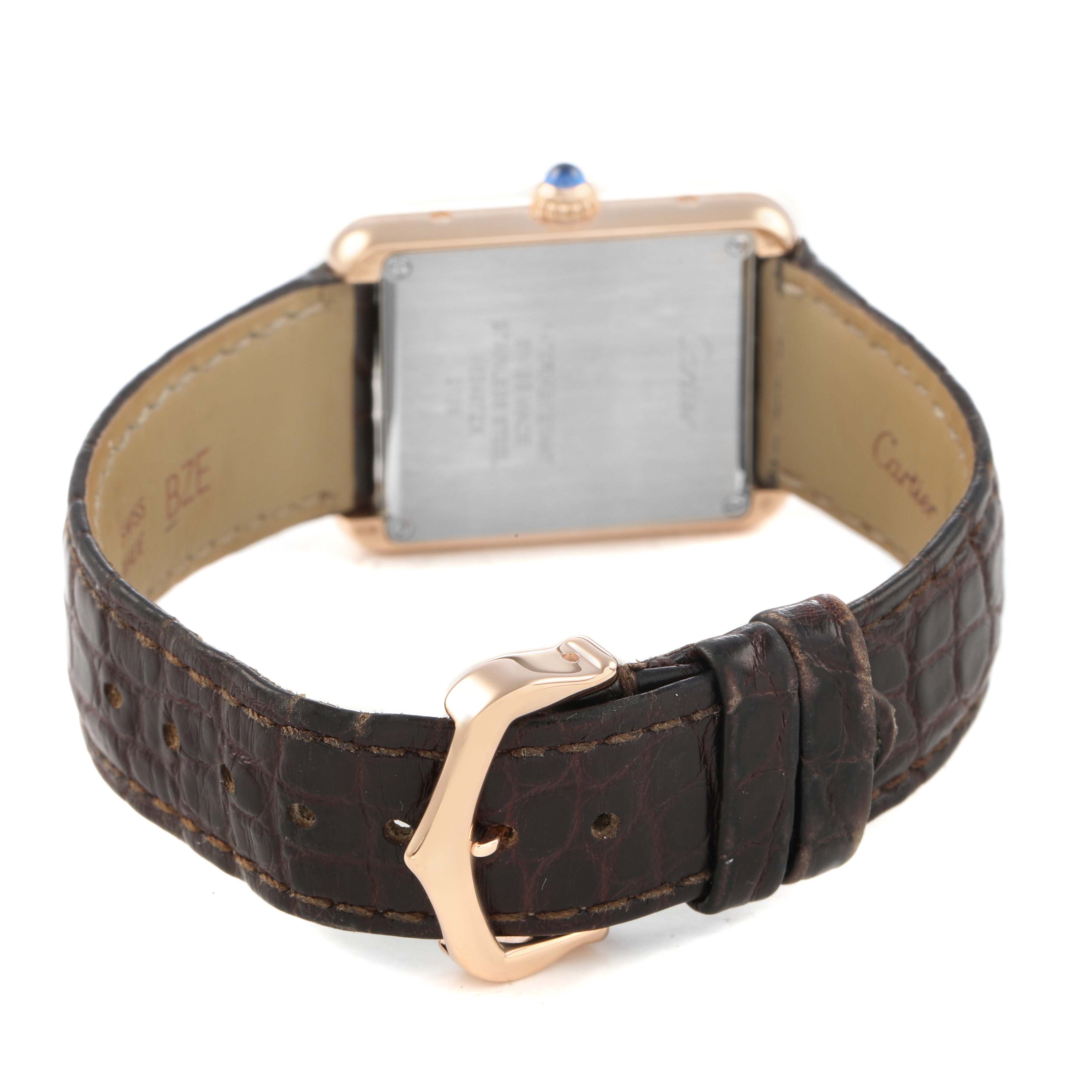 The image shows the back view of a Cartier Tank Solo W5200024 Women's Rose Gold Silver Dial watch, highlighting the strap, clasp, and case back.