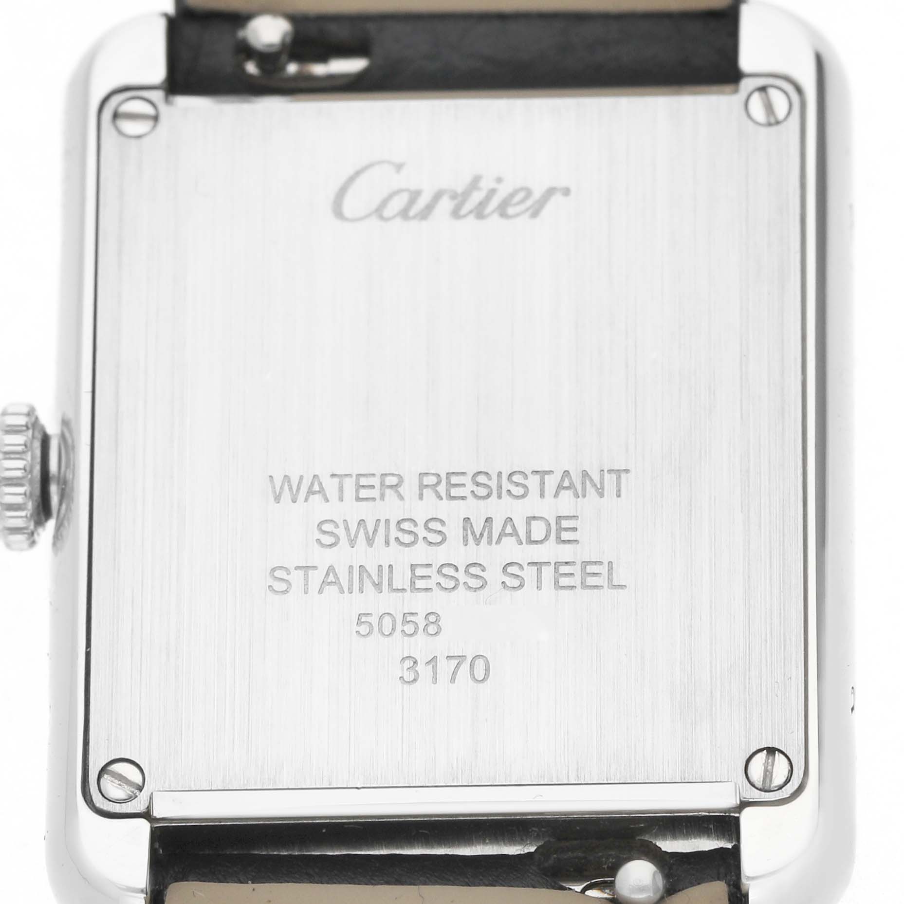 The image shows the back case of a Cartier Tank Solo WSTA0030 Women's Stainless Steel Silver Dial watch, highlighting its stainless steel material and water resistance.