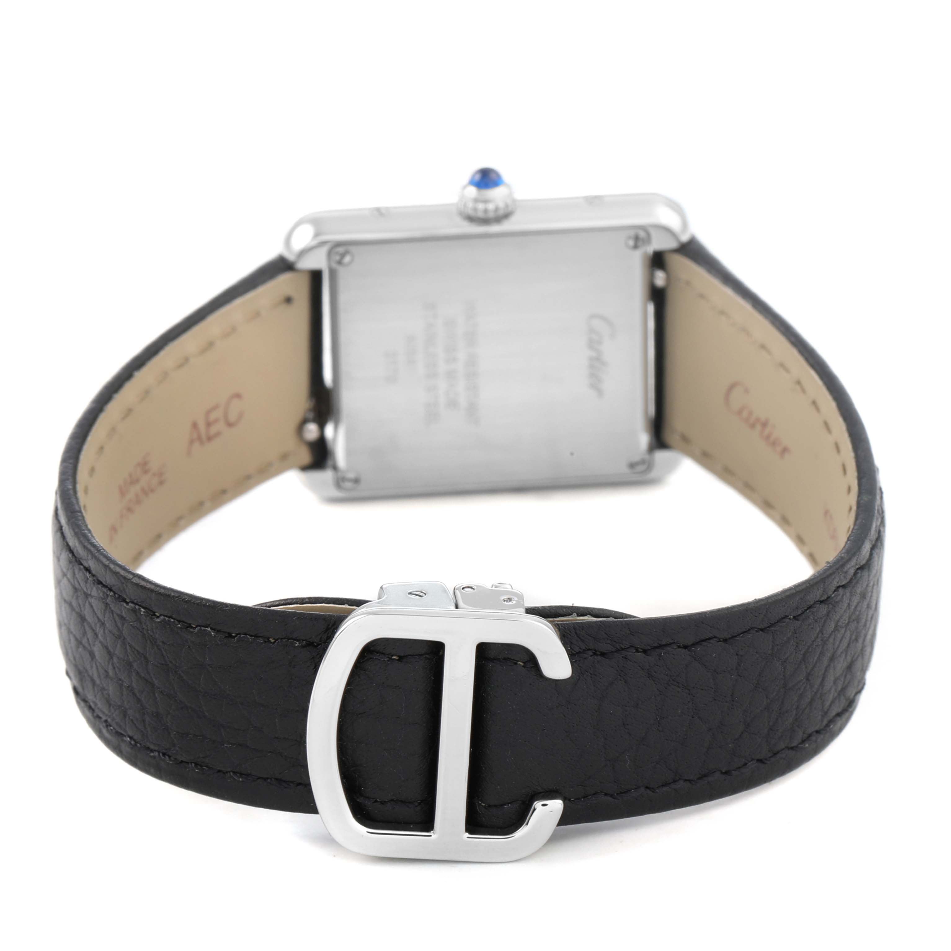 The Cartier Tank Solo WSTA0030 Women's Stainless Steel Silver Dial watch is shown from the back, highlighting the buckle and case back with signature details.