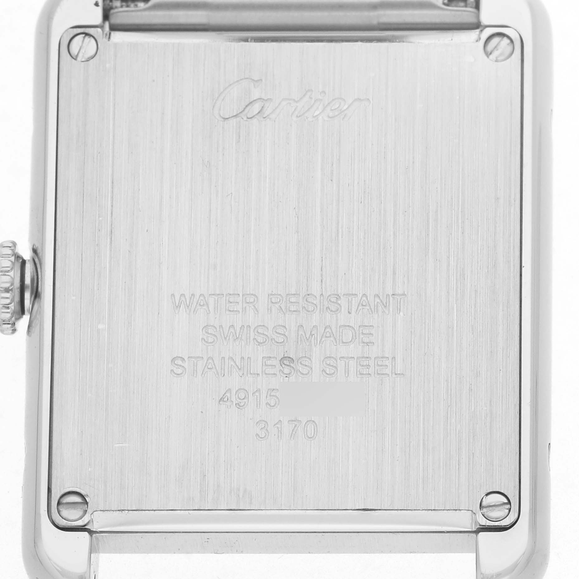 The image shows the back of the Cartier Tank Solo W5200013 Women's Stainless Steel Silver Dial watch, highlighting the stainless steel case and engraved details.