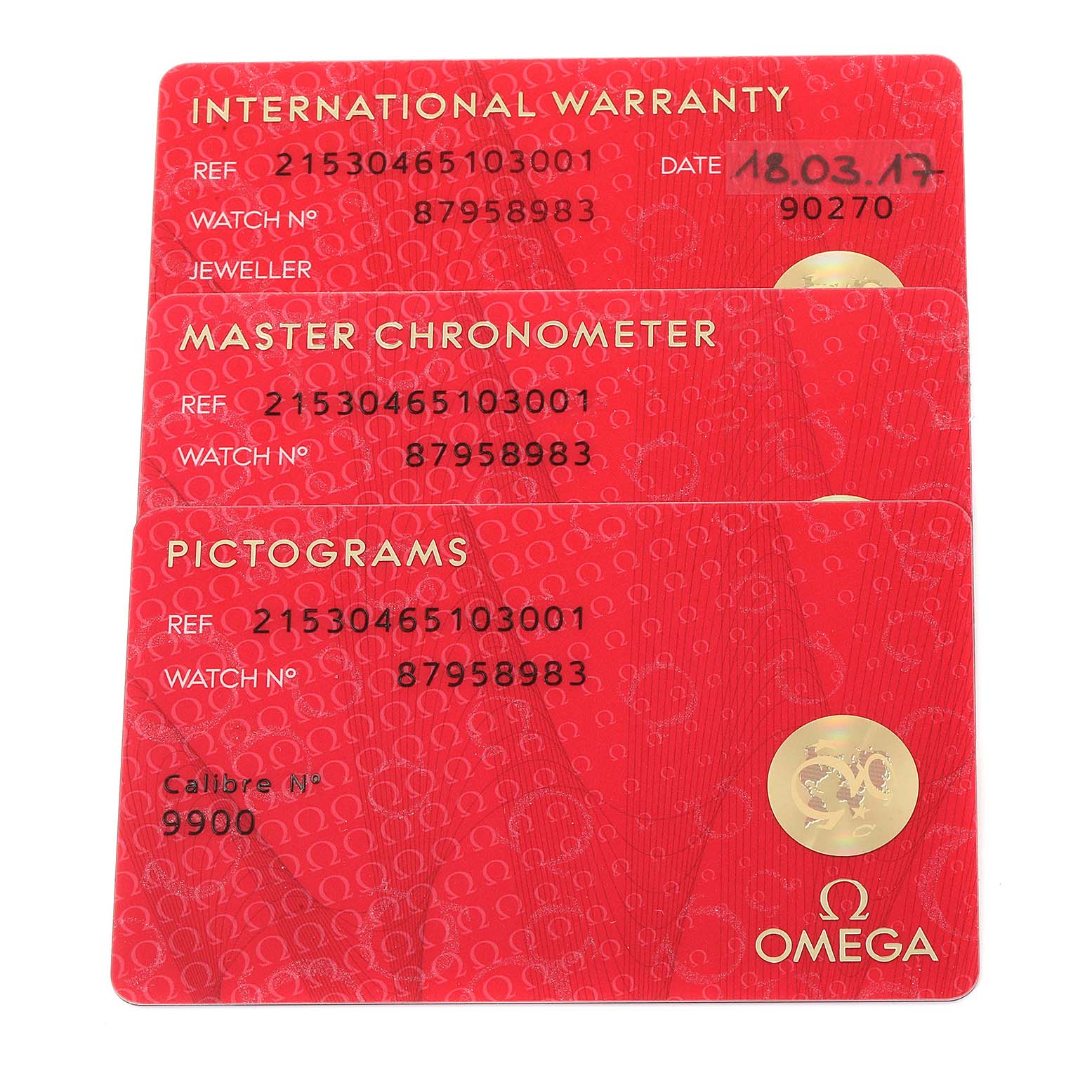 This image shows three Omega Planet Ocean 215.30.46.51.03.001 Men
s Stainless Steel Blue Dial 215.30.46.51.03.001 Men
s Stainless Steel Blue Dial watch documentation cards: International Warranty, Master Chronometer, and Pictograms.