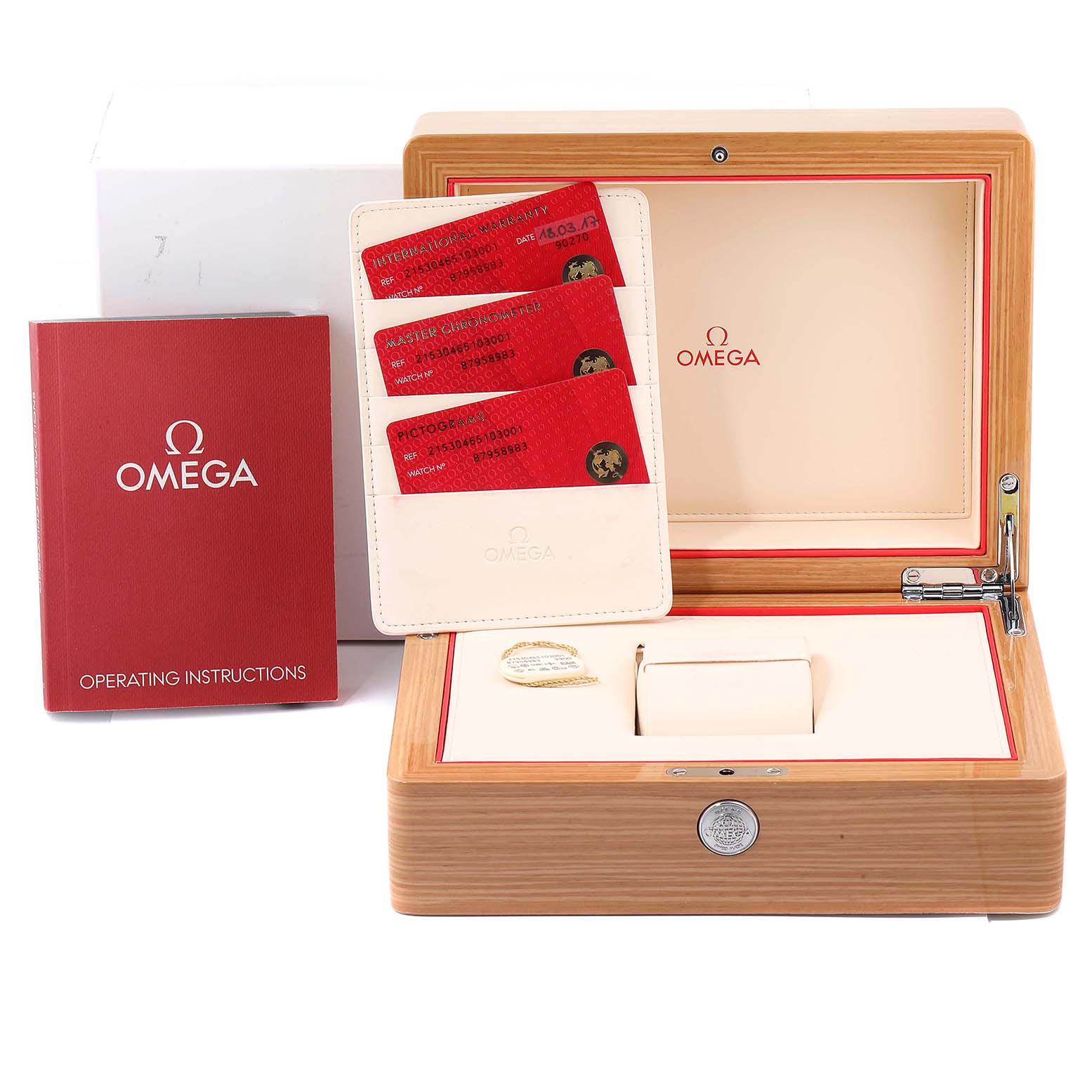 The image shows the accessories of the Omega Planet Ocean 215.30.46.51.03.001 Men
s Stainless Steel Blue Dial 215.30.46.51.03.001 Men
s Stainless Steel Blue Dial watch, including the box, operating instructions, and cards.