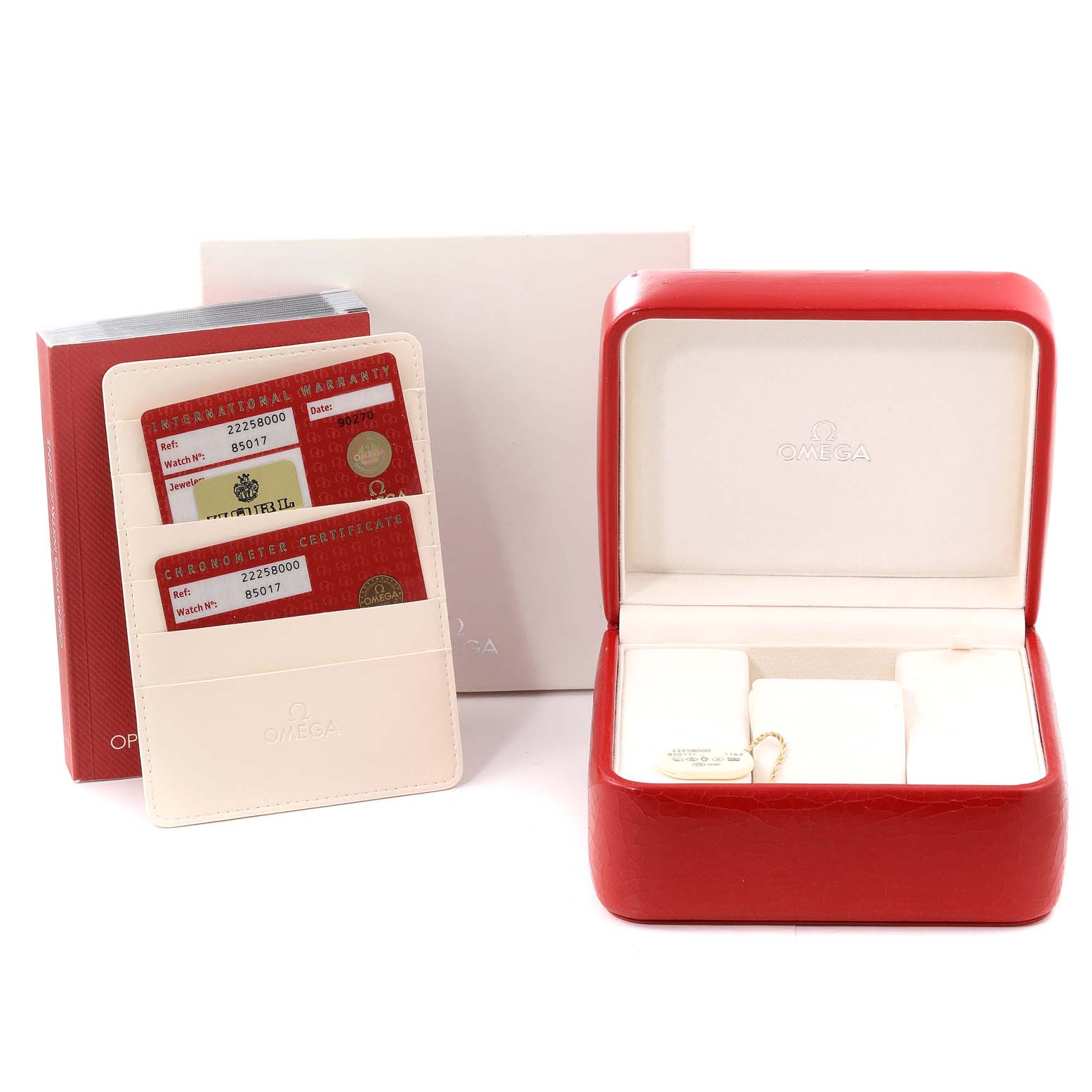 The image shows the accessories for an Omega Seamaster 2225.80.00 Men's Stainless Steel Blue Dial 2225.80.00 Men's Stainless Steel Blue Dial, including warranty cards, a booklet, and a red watch box.