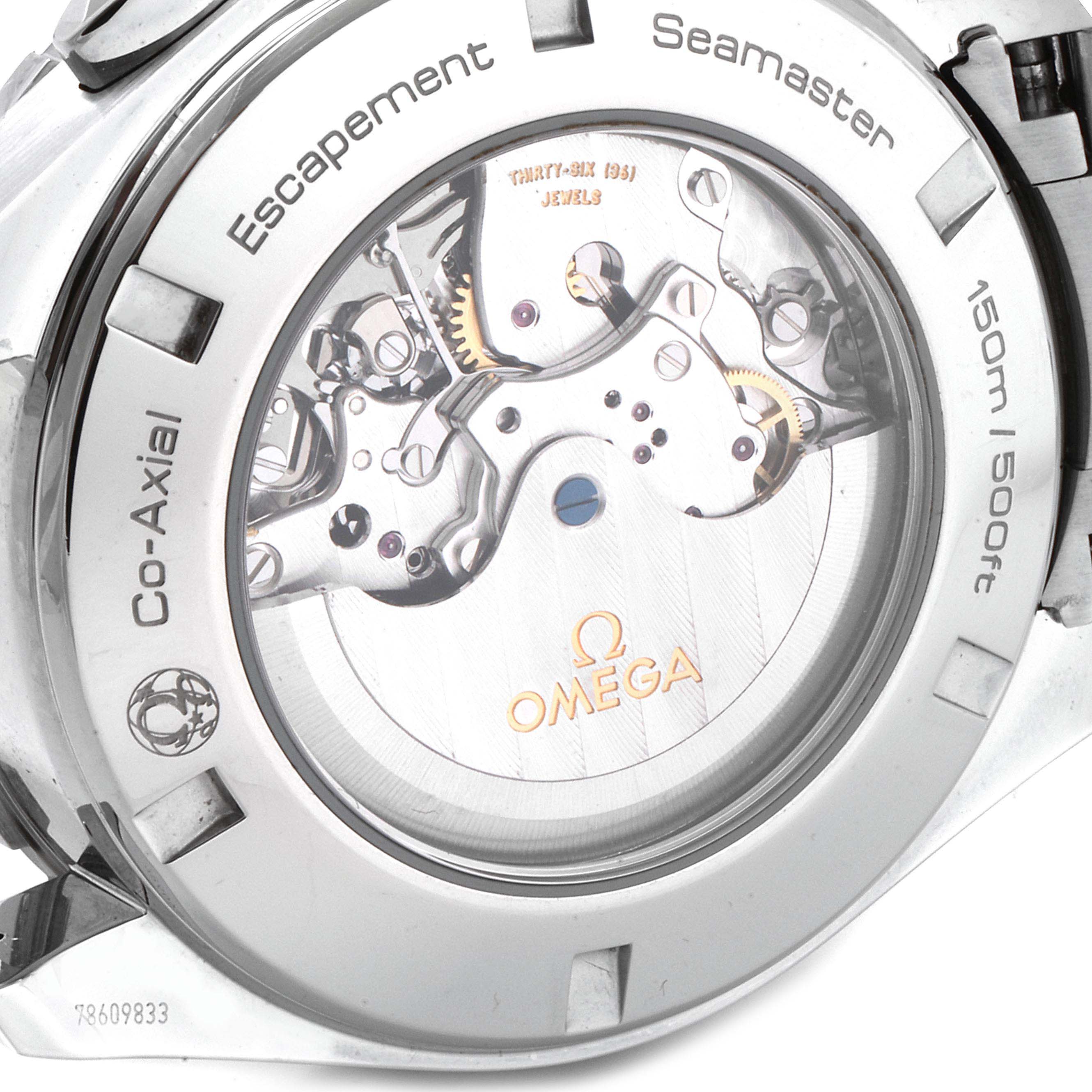 The image shows the backside of the Omega Aqua Terra 231.10.44.52.04.001 Men
s Stainless Steel White Dial 231.10.44.52.04.001 Men
s Stainless Steel White Dial watch, displaying its intricate mechanical movements and branding.