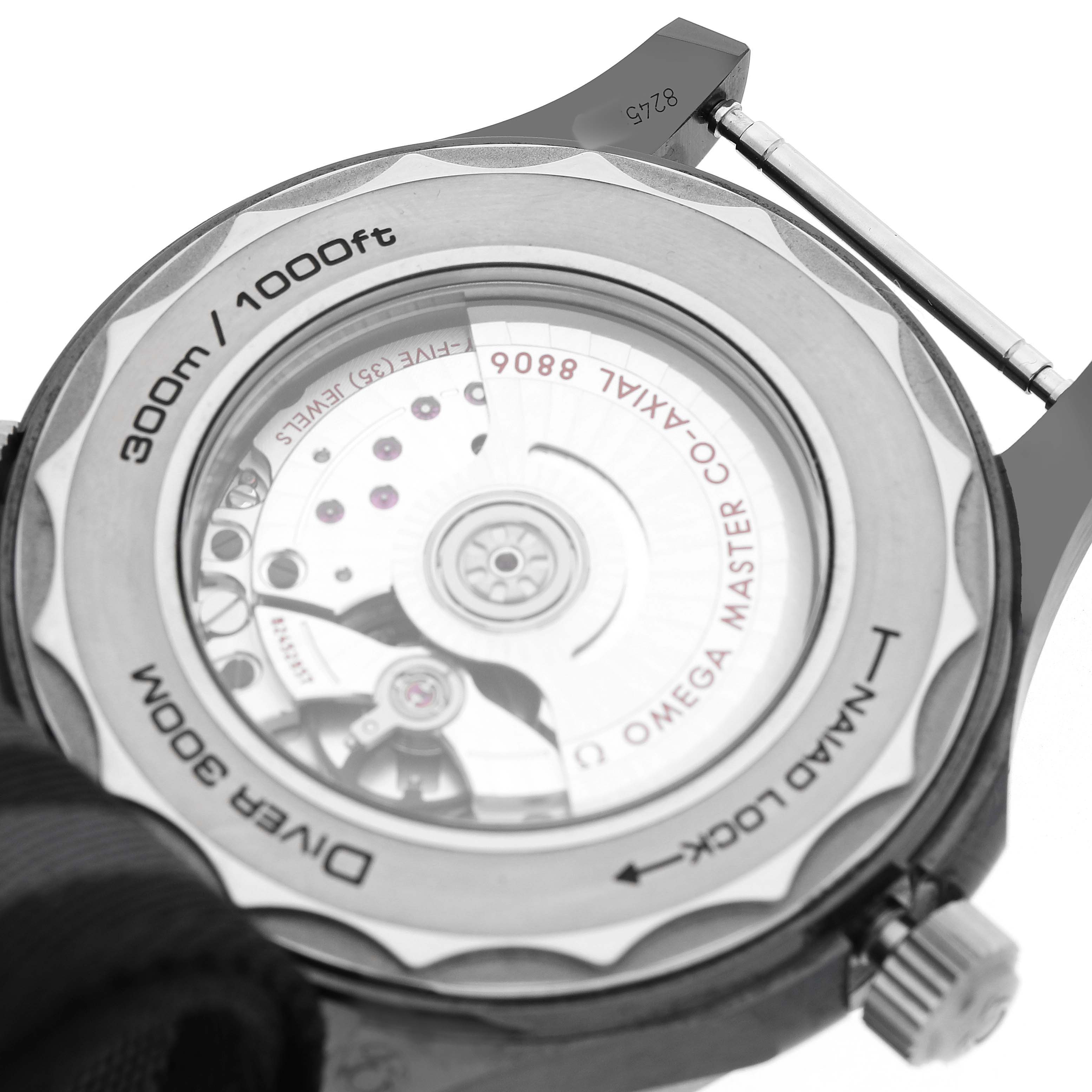 The image shows the back of an Omega Seamaster 210.92.44.20.01.001 Men's Ceramic Black Dial, displaying its transparent case back and internal mechanism.