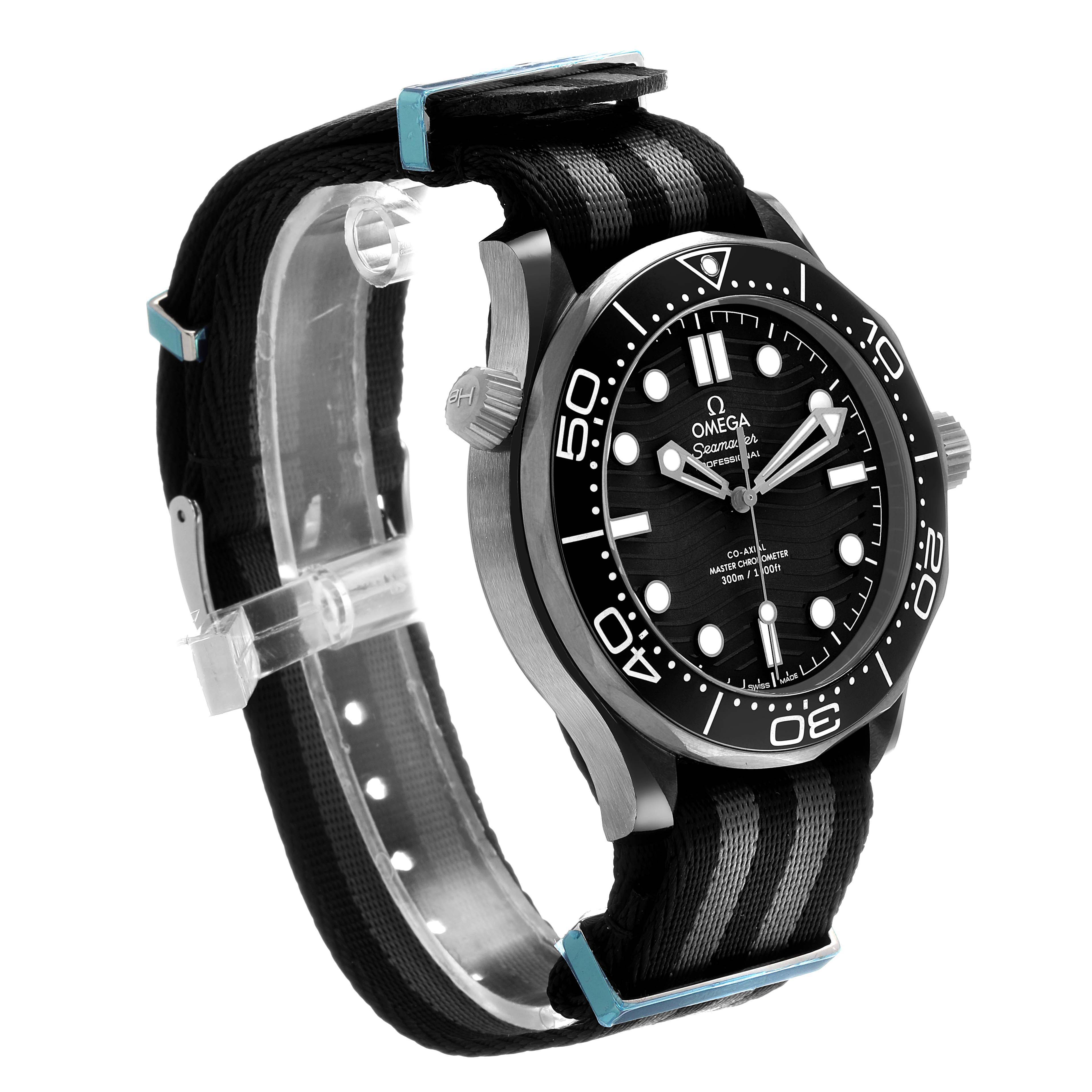 The Omega Seamaster 210.92.44.20.01.001 Men's Ceramic Black Dial watch is shown at a three-quarters angle, displaying the face, bezel, crown, and fabric strap.
