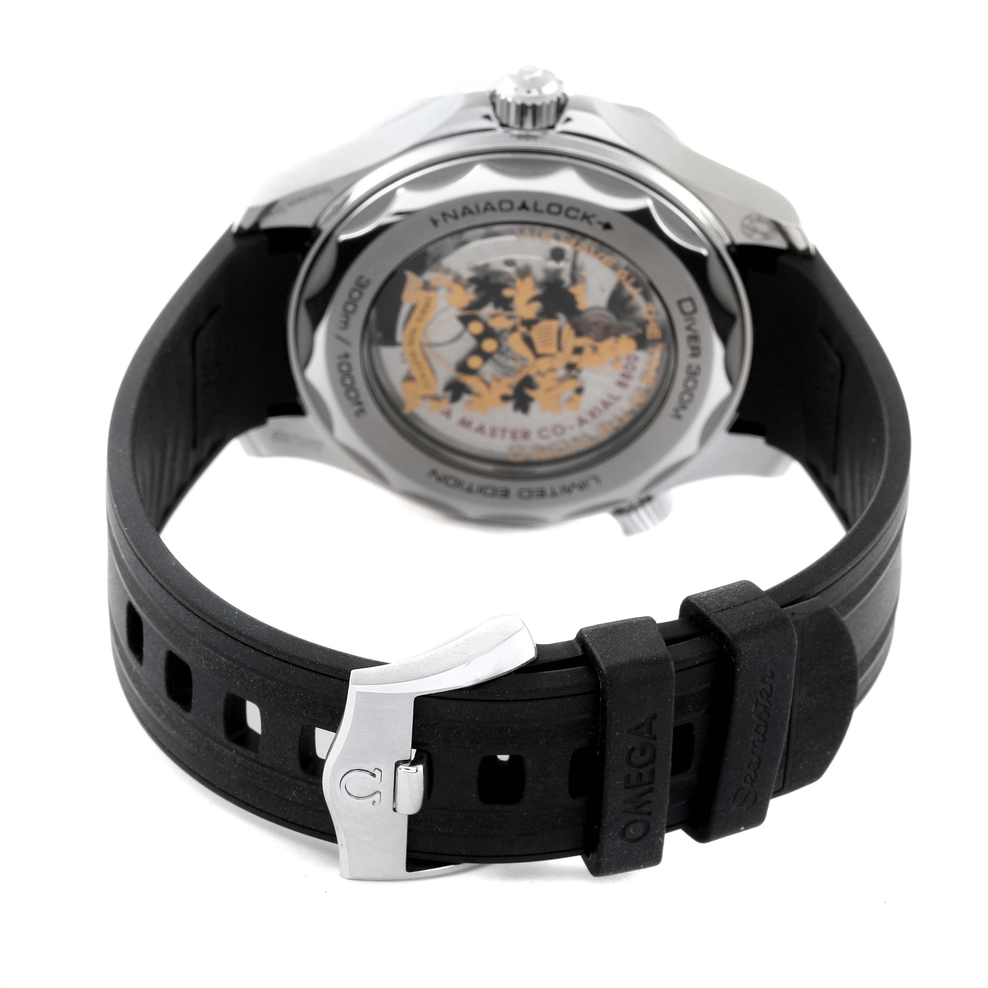 The image shows the Omega Seamaster 210.22.42.20.01.004 Men's Stainless Steel Black Dial 210.22.42.20.01.004 Men's Stainless Steel Black Dial watch from the back, displaying its mechanism and rubber strap with a buckle.