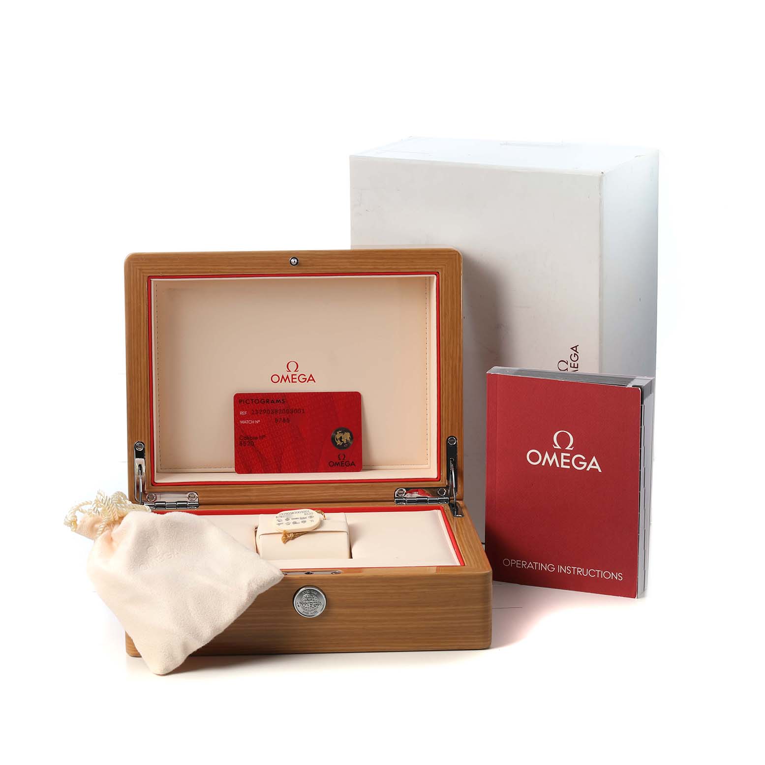 The image shows the Omega Seamaster 232.90.38.20.03.001 Men's Stainless Steel Blue Dial watch box, a red operating instructions booklet, and a card with packaging accessories.