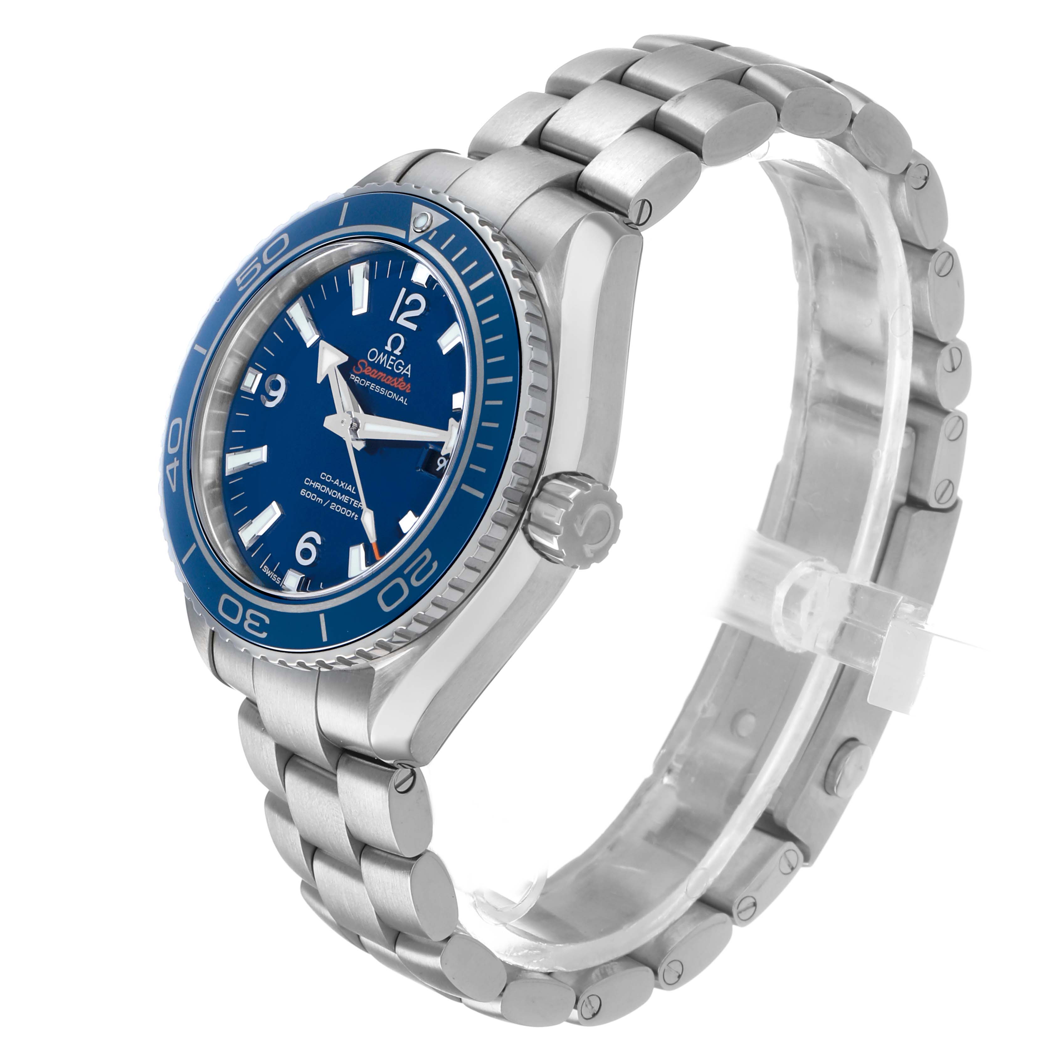 The Omega Seamaster 232.90.38.20.03.001 Men's Stainless Steel Blue Dial watch is shown from a side angle displaying the bracelet, crown, and face with a blue bezel.