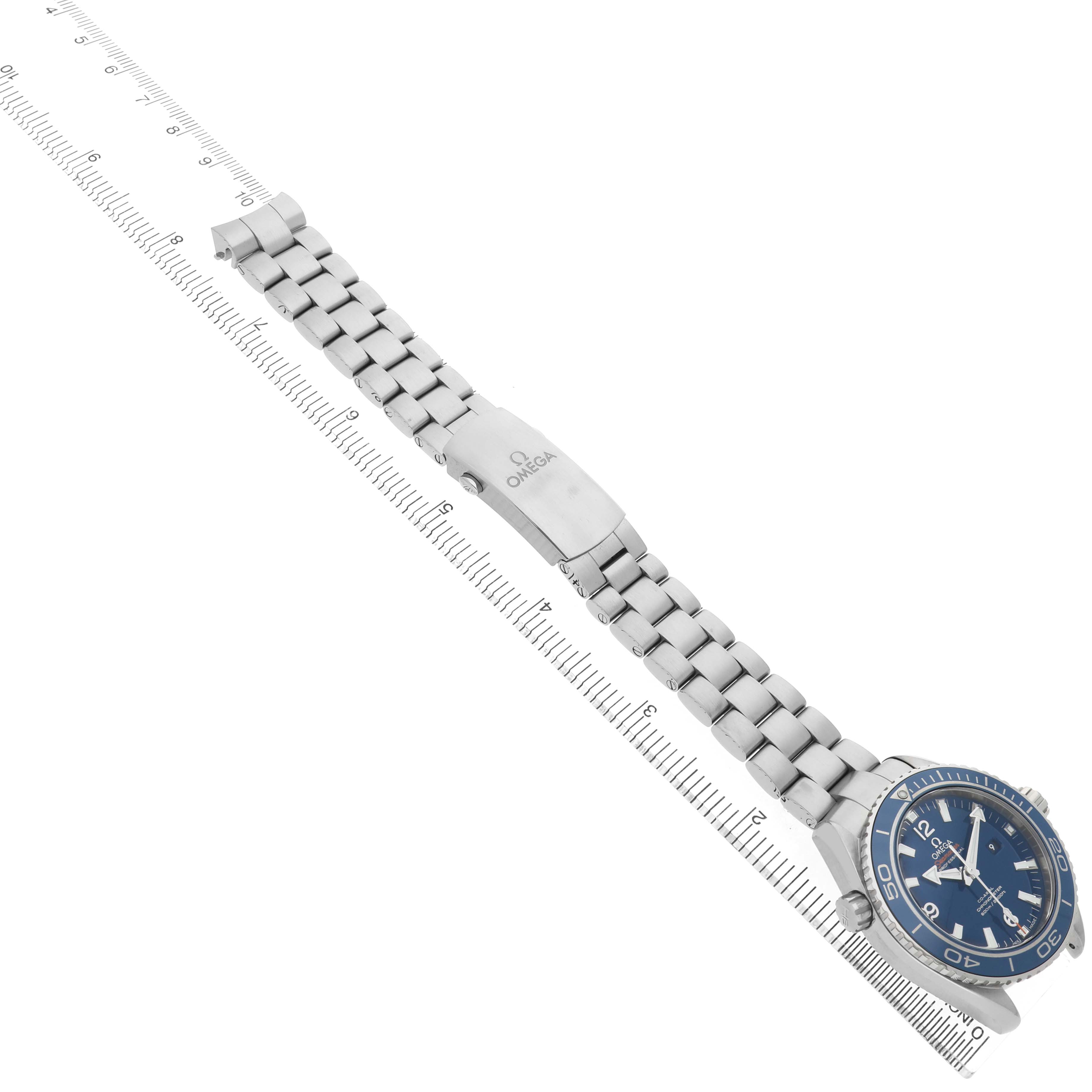 The Omega Seamaster 232.90.38.20.03.001 Men's Stainless Steel Blue Dial watch is shown at a diagonal angle highlighting its metal bracelet and clasp.
